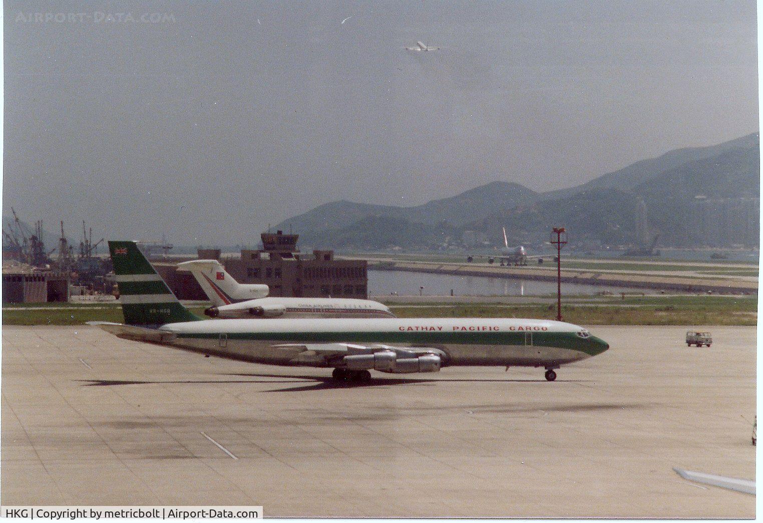 Hong Kong International Airport, Hong Kong Hong Kong (HKG) - Cathay Pacific Cargo B707-320C,China Airlines B727 and Cargolux B747(on runway)HKG Kai Tak Airport,Sept.1979