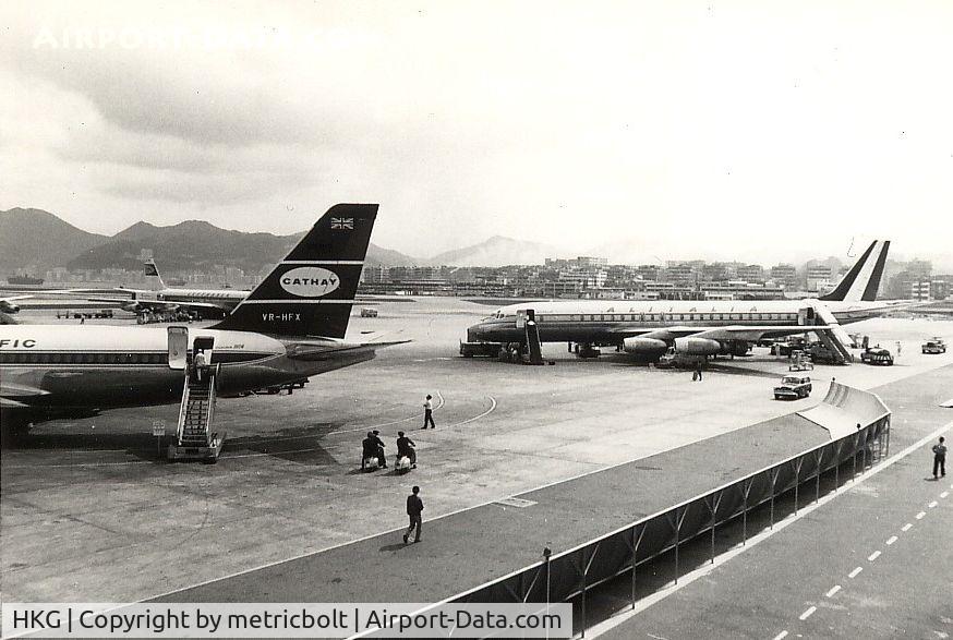 Hong Kong International Airport, Hong Kong Hong Kong (HKG) - March 1967,HKG Kai Tak airport.Cathay Pacific,Alitalia and Lufthansa share the ramp