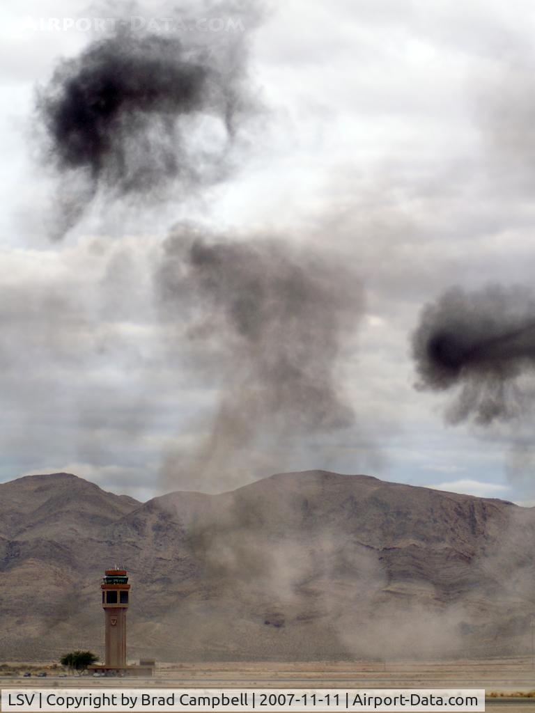 Nellis Afb Airport (LSV) - Nellis AFB ATCT with smoke from mock wargames. Aviation Nation 2007
