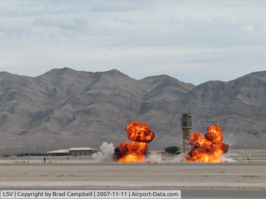 Nellis Afb Airport (LSV) - Nellis AFB ATCT with smoke from mock wargames. Aviation Nation 2007