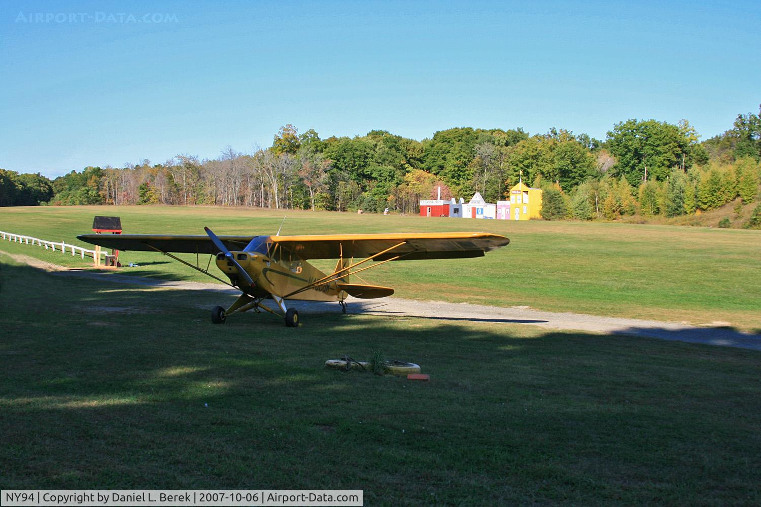 Old Rhinebeck Airport (NY94) - The main turf runway is surrounded by make-believe buildings that are part of the backdrop of the WWI reenactments that take place.