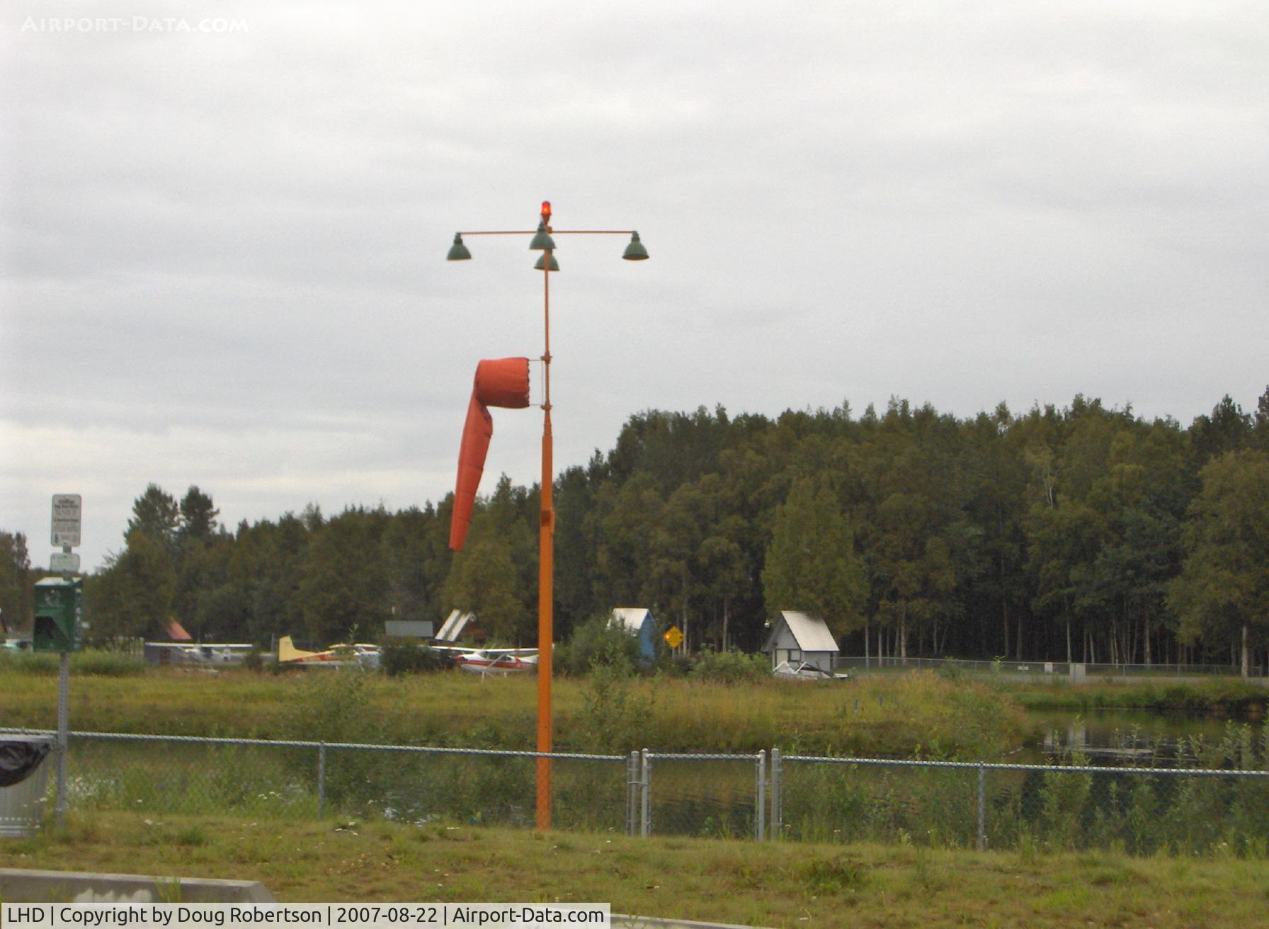 Lake Hood Seaplane Base (LHD) - Lighted windsock for E-W 4,540' X 188' fresh water takeoff/landing lane-at east end, wind calm-if flying horizontal wind is 15 knots or greater