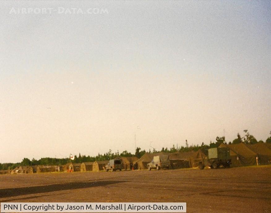 Princeton Municipal Airport (PNN) - The military used this airport for practice for some time in the late 80's or early 90's. My father brought me there to see the activity, and I took this photograph with a cheap 110 camera.