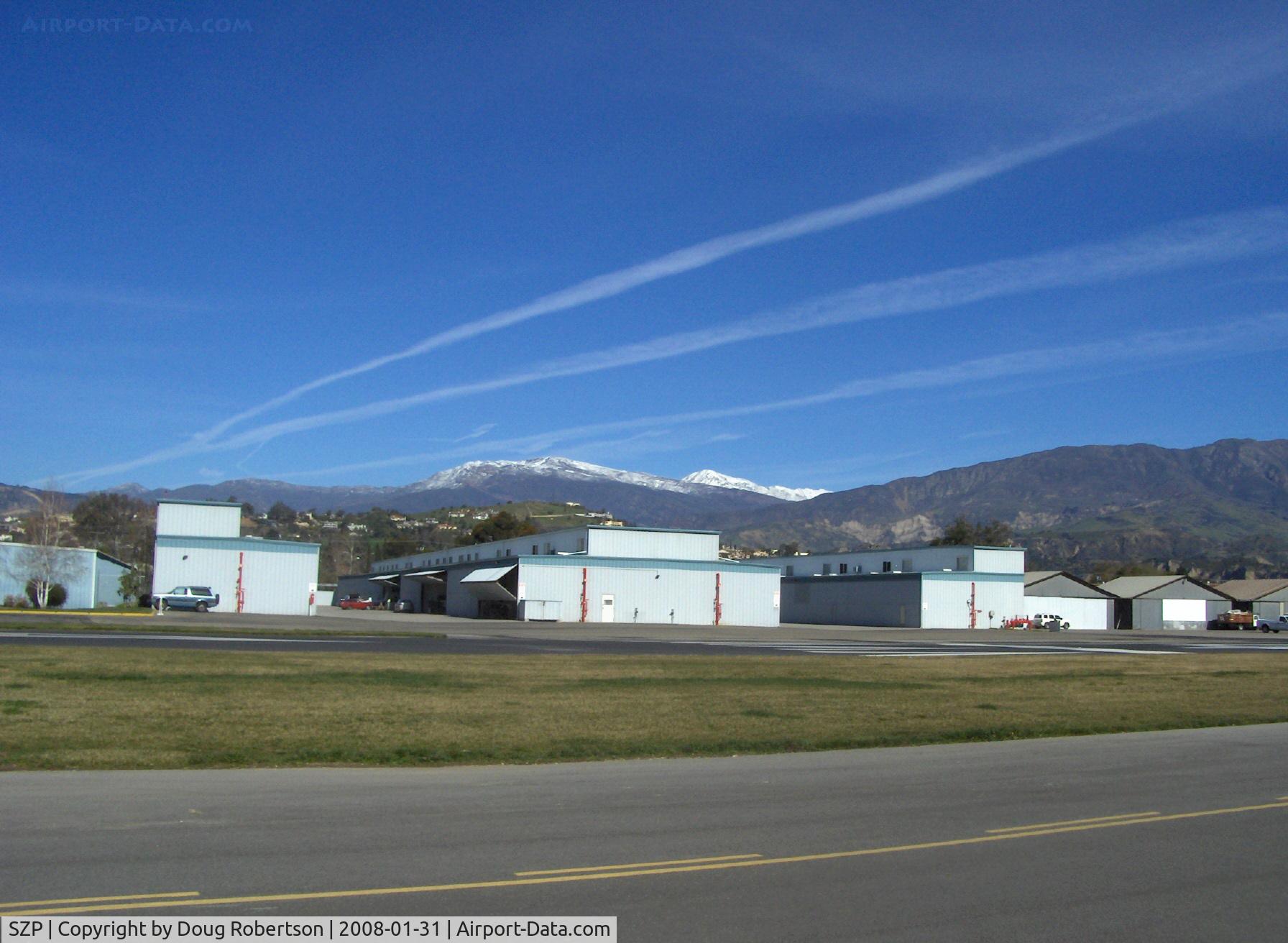 Santa Paula Airport (SZP) - Jet contrails over snow on Topa Topa Mountains