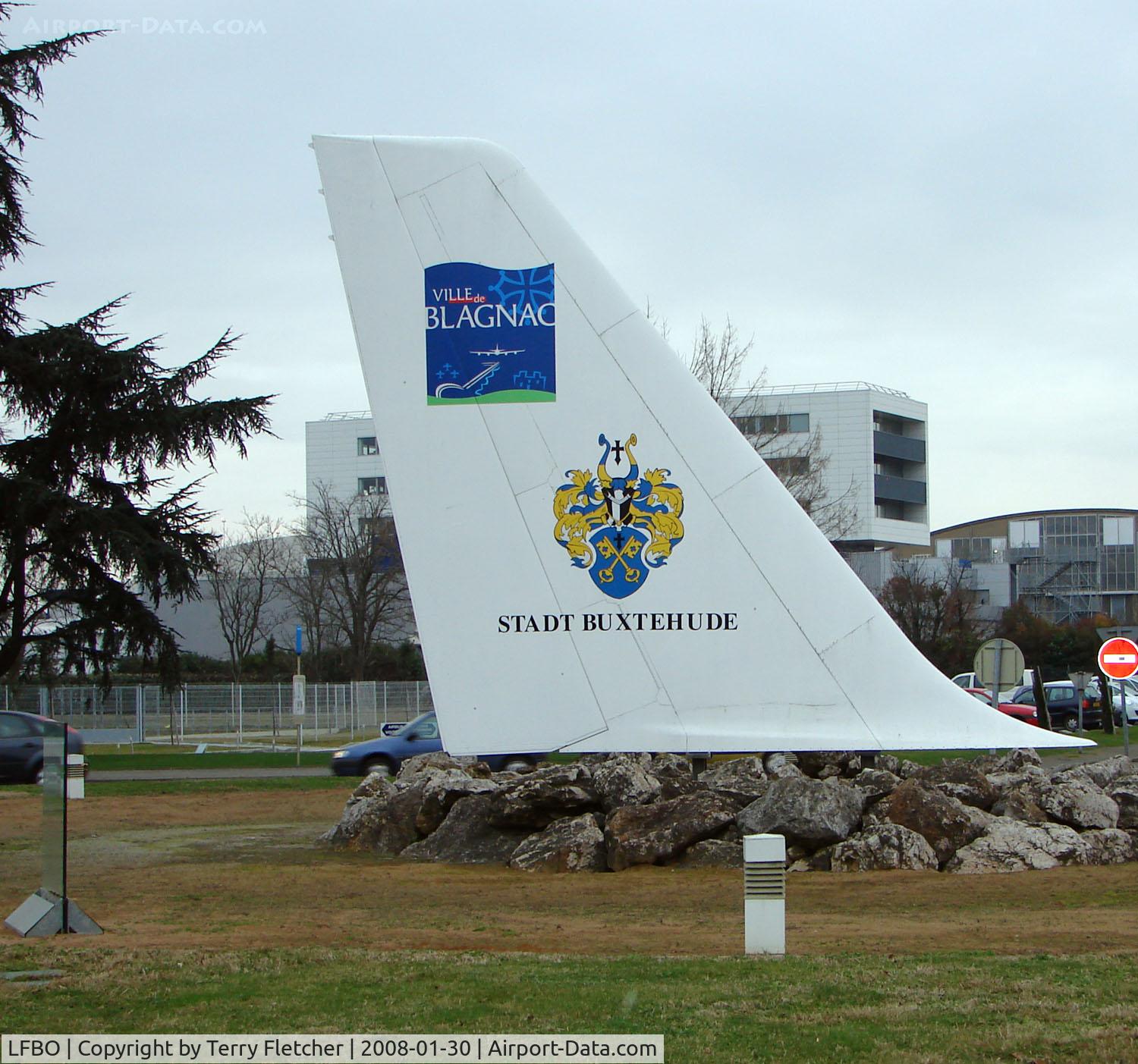 Toulouse Airport, Blagnac Airport France (LFBO) - Magnificent Tail (DC-8?) on a road island at the entrance to the Freight Zone at Toulouse