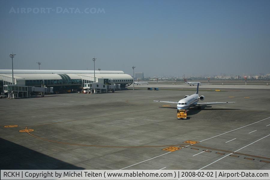 Kaohsiung International Airport, Kaohsiung City Taiwan (RCKH) - Fokker 100 from Mandarin Arilines pushed back from International Terminal