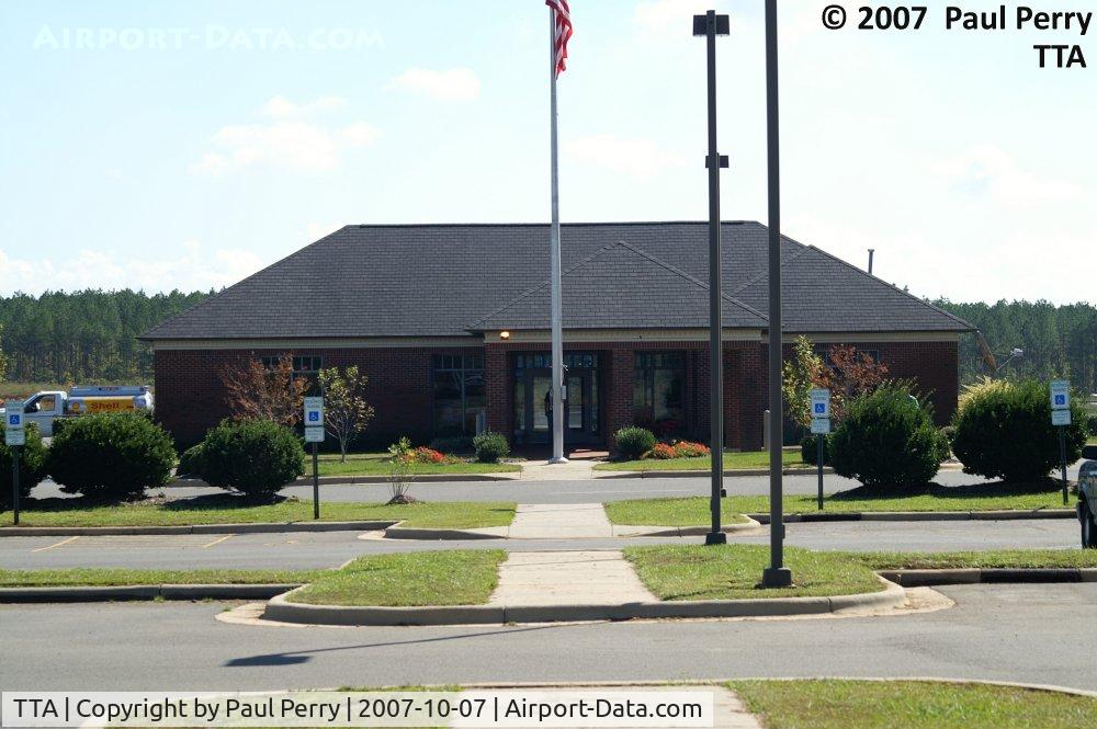 Raleigh Exec Jetport At Sanford-lee County Airport (TTA) - The terminal building, and some idea of the ample parking