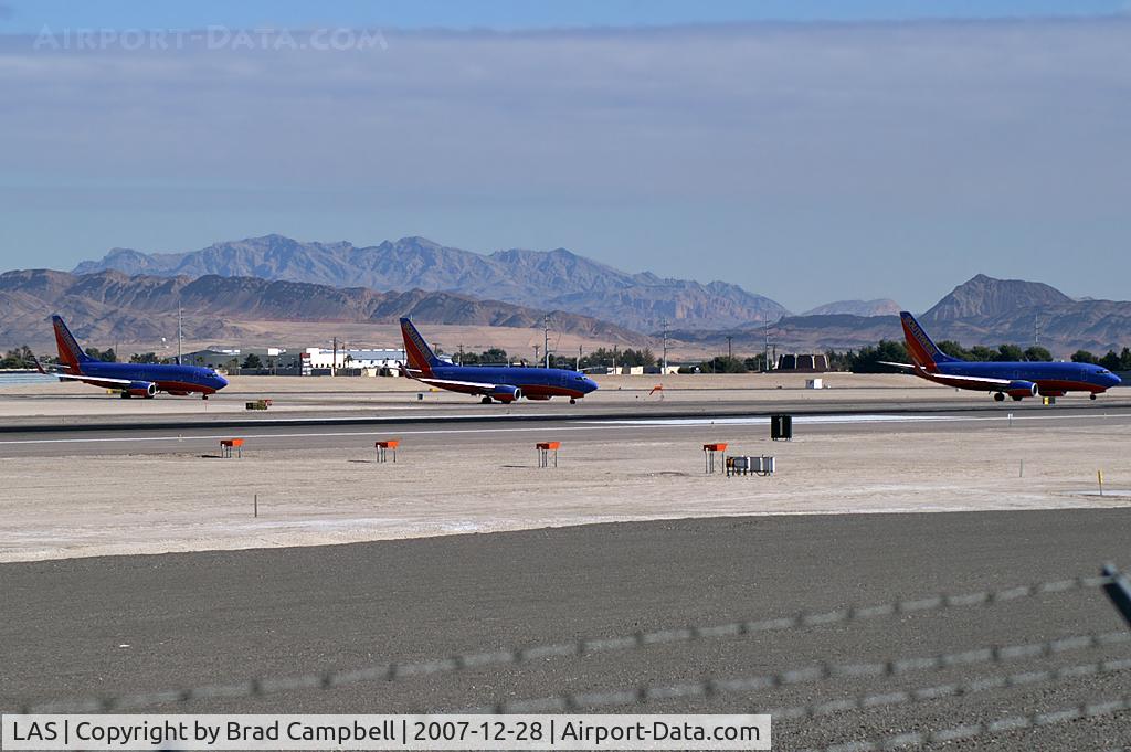 Harry Reid International Airport (LAS) - Bluebirds gathered at the end of RWY 25R