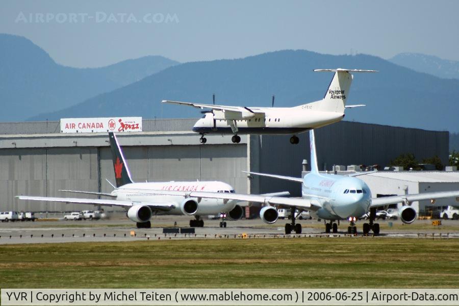 Vancouver International Airport, Vancouver, British Columbia Canada (YVR) - DHC-8 landing while one 767 and one A340 are waiting for take-off