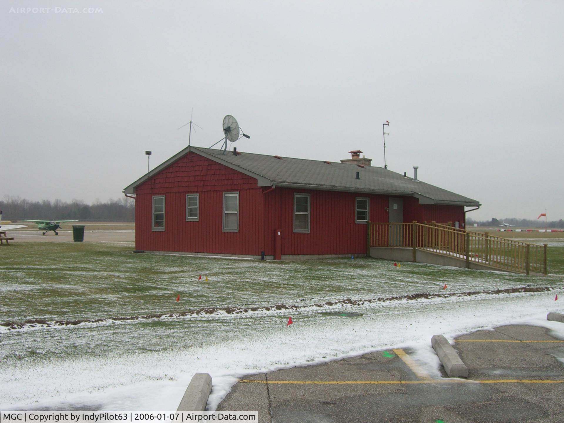 Michigan City Muni-phillips Field Airport (MGC) - The Michigan City FBO with the friendly cat guarding the building...
