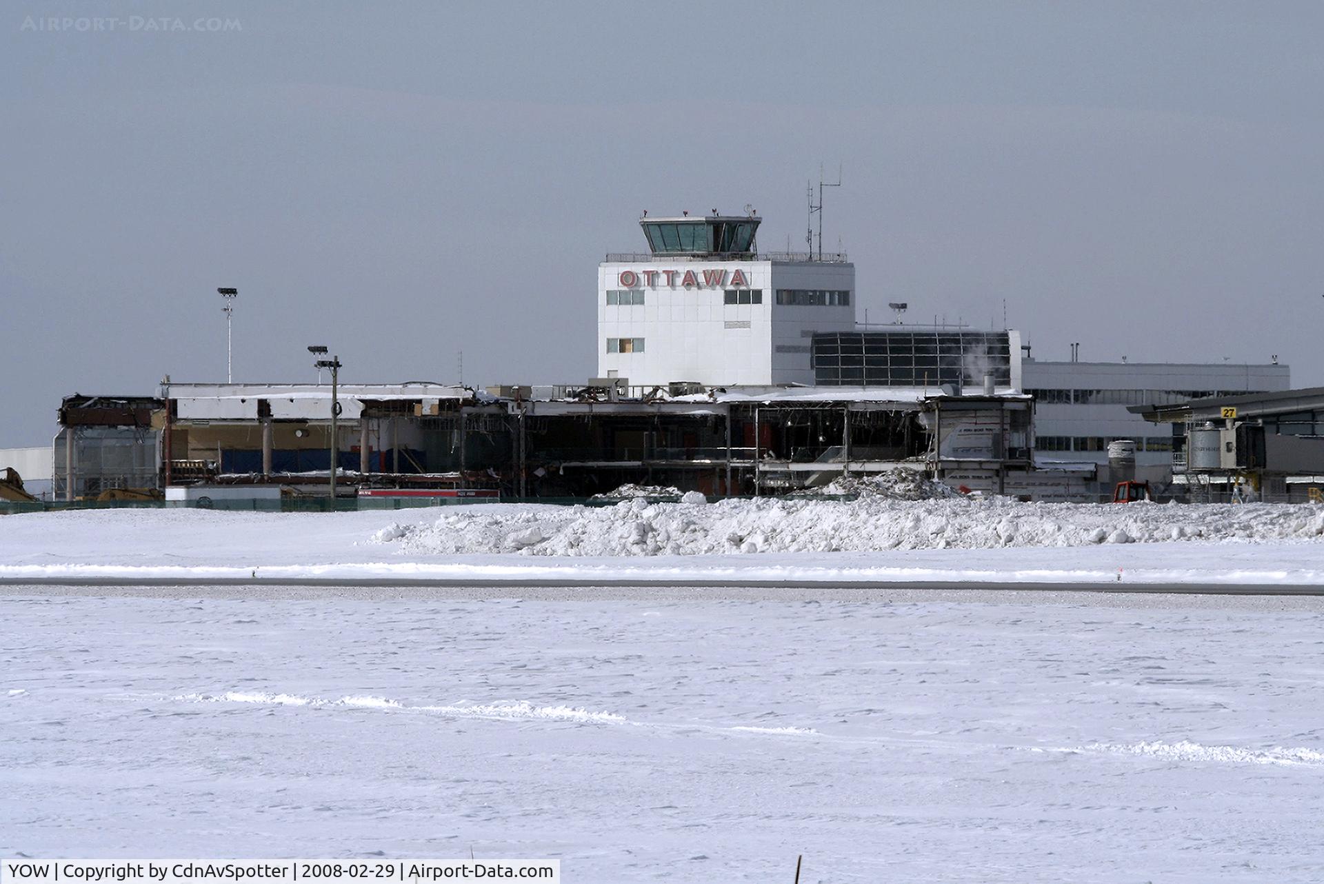 Ottawa Macdonald-Cartier International Airport (Macdonald-Cartier International Airport), Ottawa, Ontario Canada (YOW) - YOW - The old Airport Terminal being demolished to make way for new ramps on the newly completed terminal Phase 2