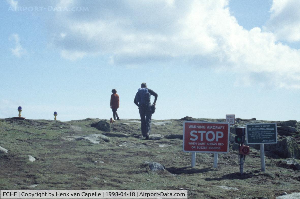 St. Mary's Airport, St. Mary's, England United Kingdom (EGHE) - St Mary's airport on the tiny island of St Mary's of the Scilly Isles off Cornwall, UK. A hiking trail around the island crosses the runway. The crossing is controlled by 