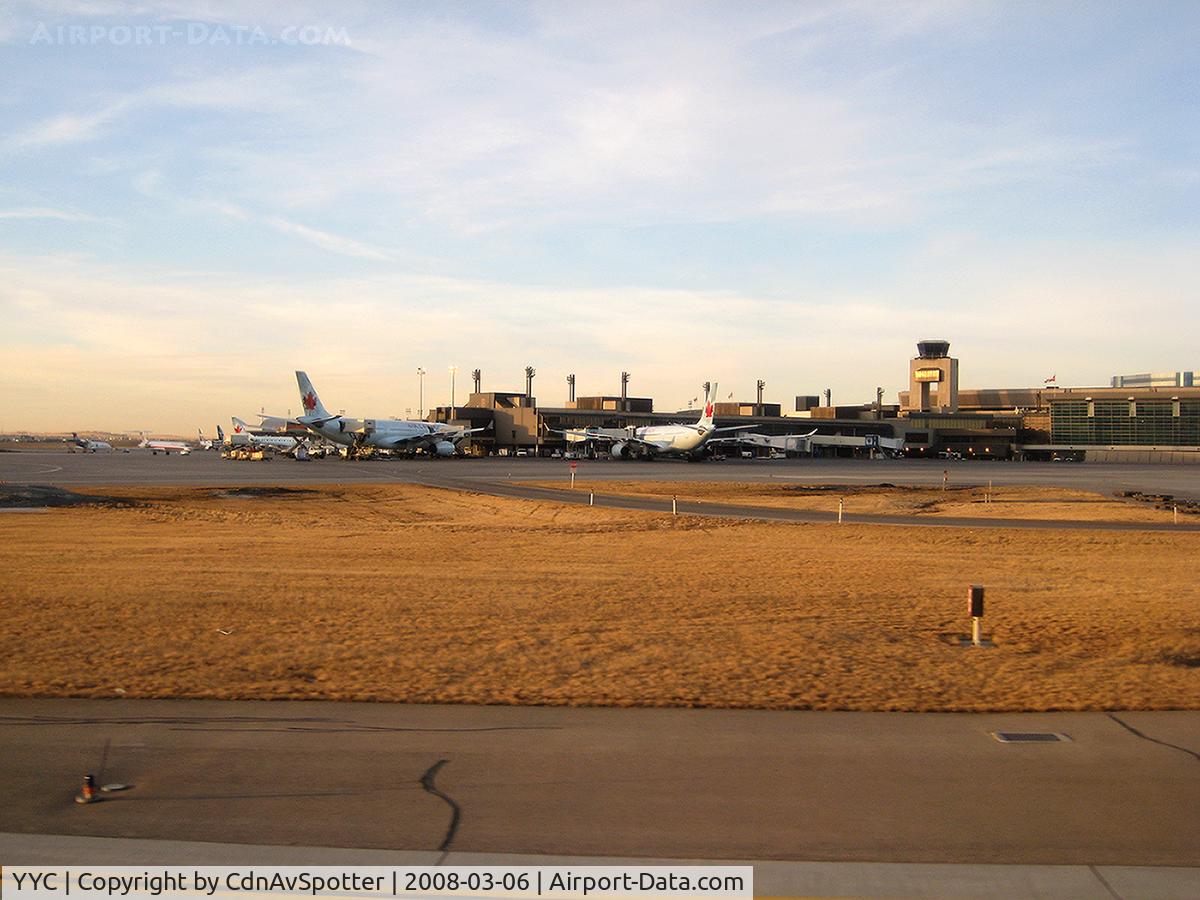 Calgary International Airport, Calgary, Alberta Canada (YYC) - YYC - A view of Concourse B & C used for all Air Canada and International flights.  In this picture are two AC 333 bound for LHR and FRA
