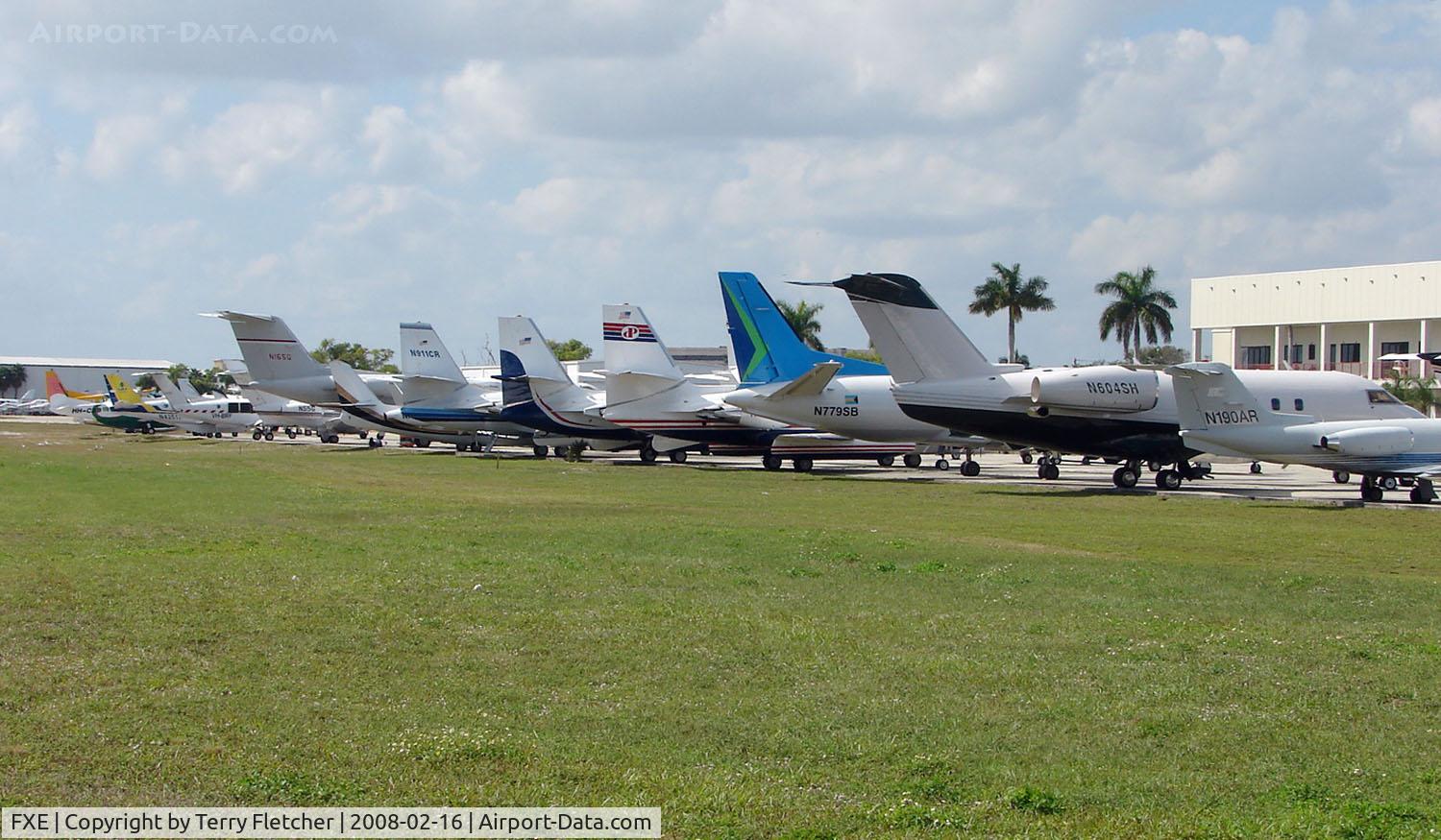 Fort Lauderdale Executive Airport (FXE) - Aview down World Jet's ramp at Ft.Lauderdale Executive reveals a diverse ramp of aircraft types , some of which now fall into the 'classic' category