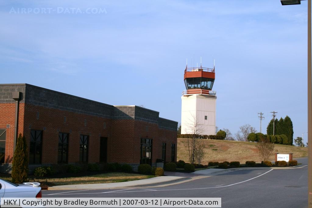 Hickory Regional Airport (HKY) - A view of the FBO (Profile Aviation) and the control tower.  The picture was taken from the parking lot in front of the old terminal building.
