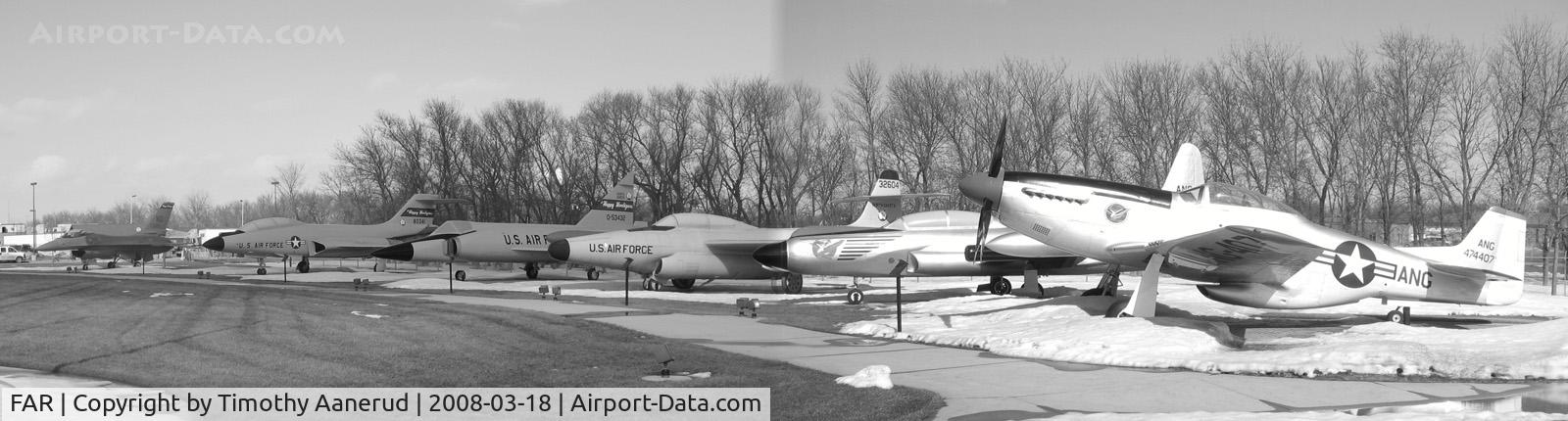 Hector International Airport (FAR) - North Dakota Air National Guard display area.  P-51, F-89, F-94, F-102, F-101, F-16. Not visible are two F-4's