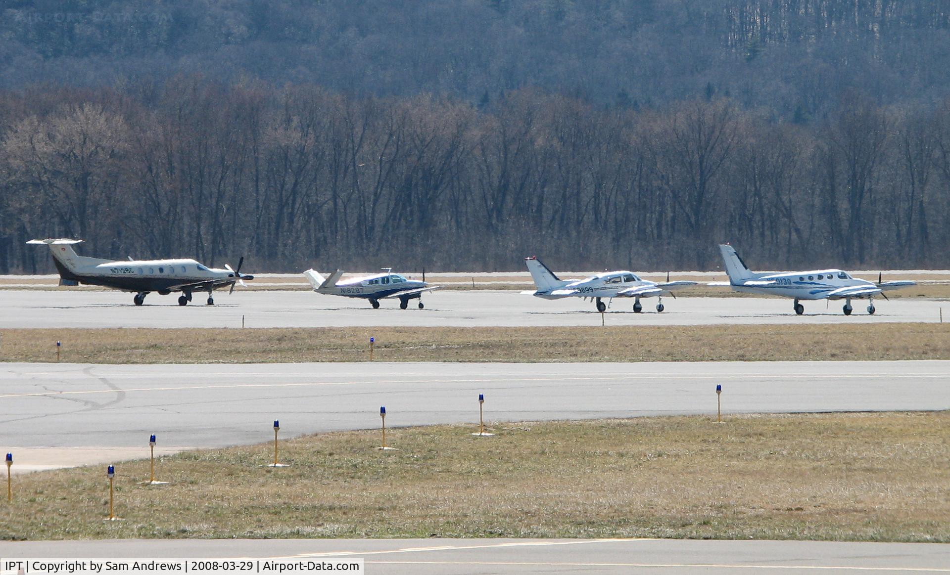 Williamsport Regional Airport (IPT) - The airport was busy today!  That is N712BC, N18287, N80699 and N5013Q.