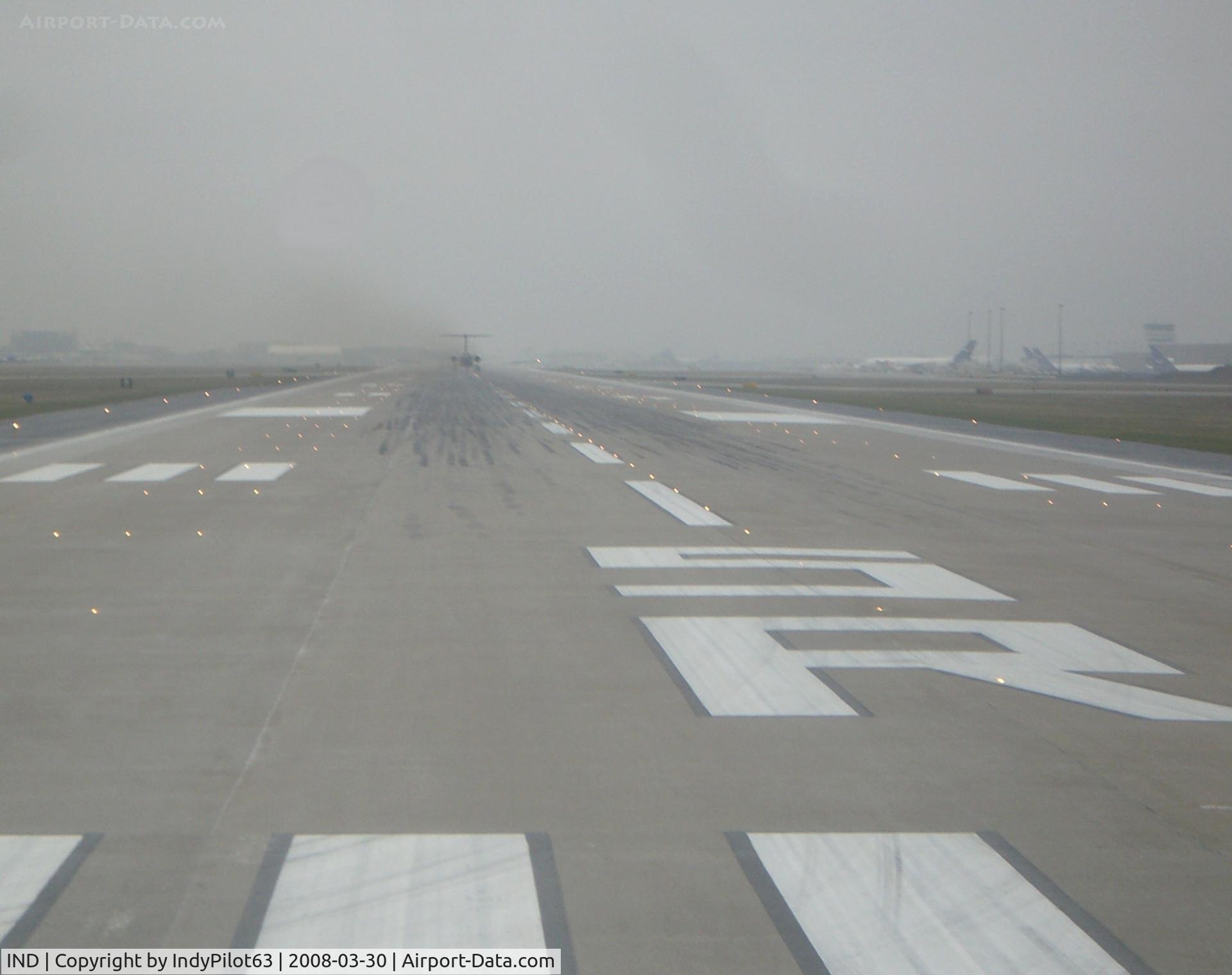 Indianapolis International Airport (IND) - Pulling on to 5R for take-off...we disappeared in a low ceiling right after leaving the ground.
