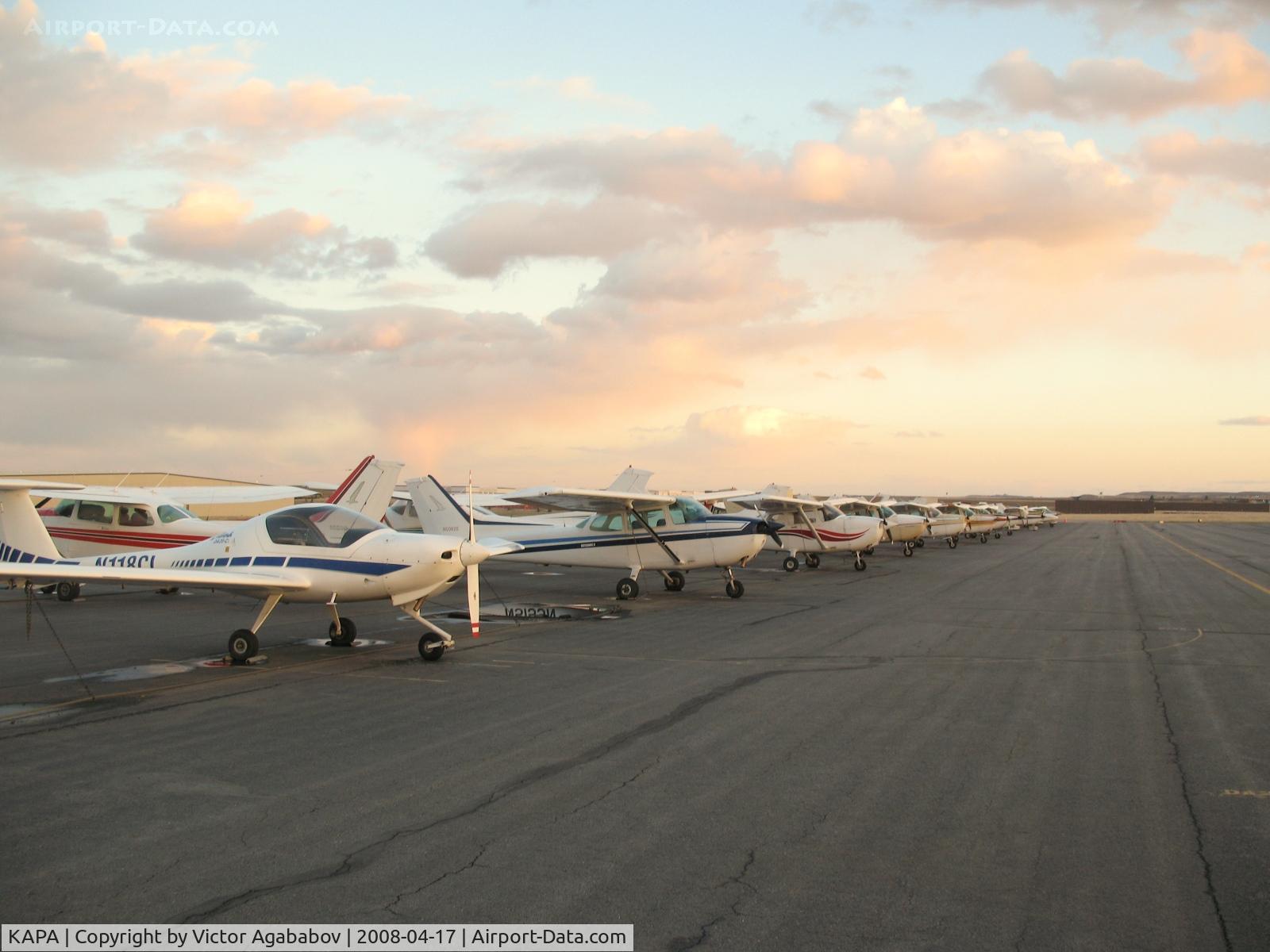 Centennial Airport (APA) - Ramp Hotel in the evening... long row of C172s...