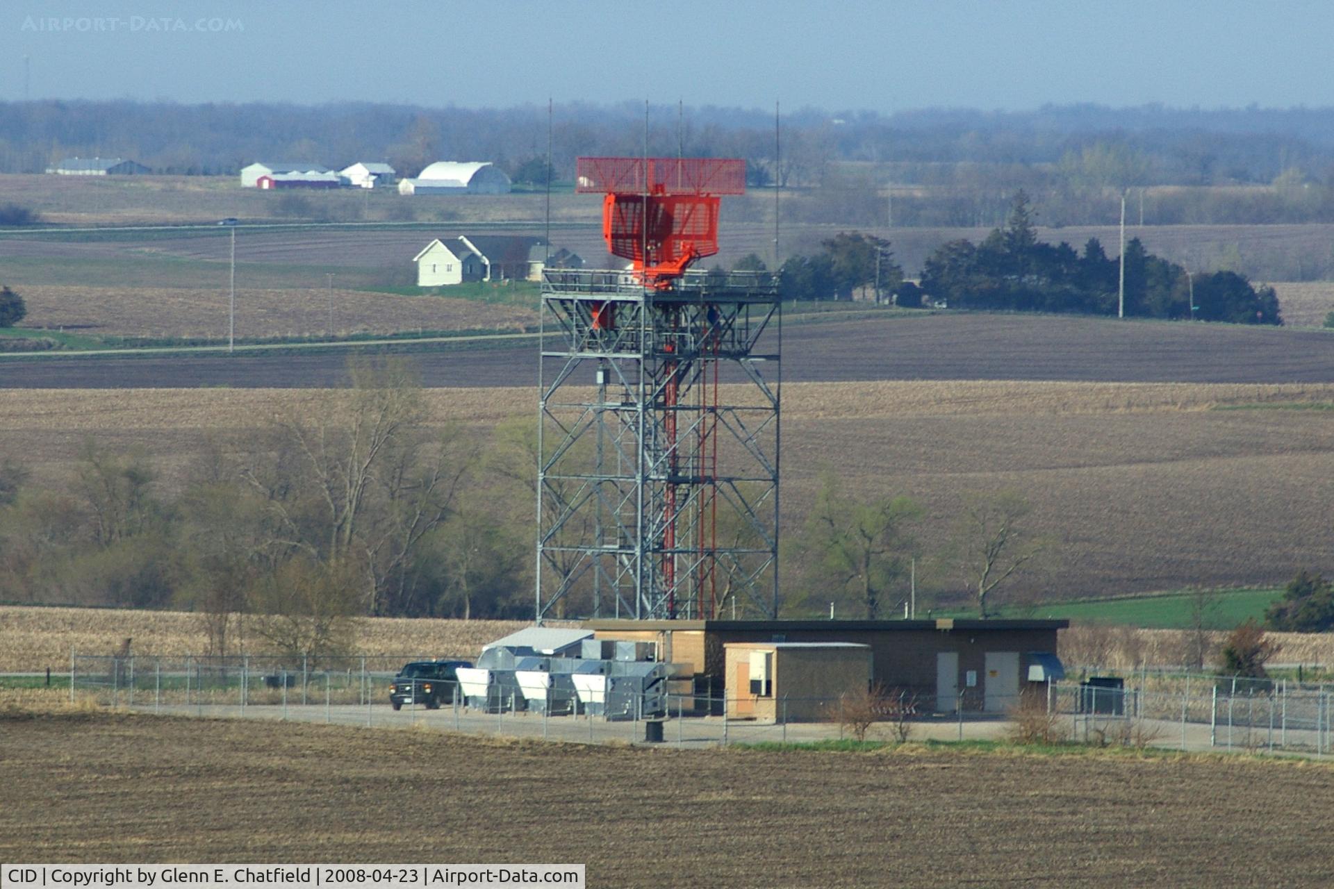 The Eastern Iowa Airport (CID) - Our ASR-9 RADAR as seen from the tower with a telephoto lens.  It's on the south side of runway 9/27