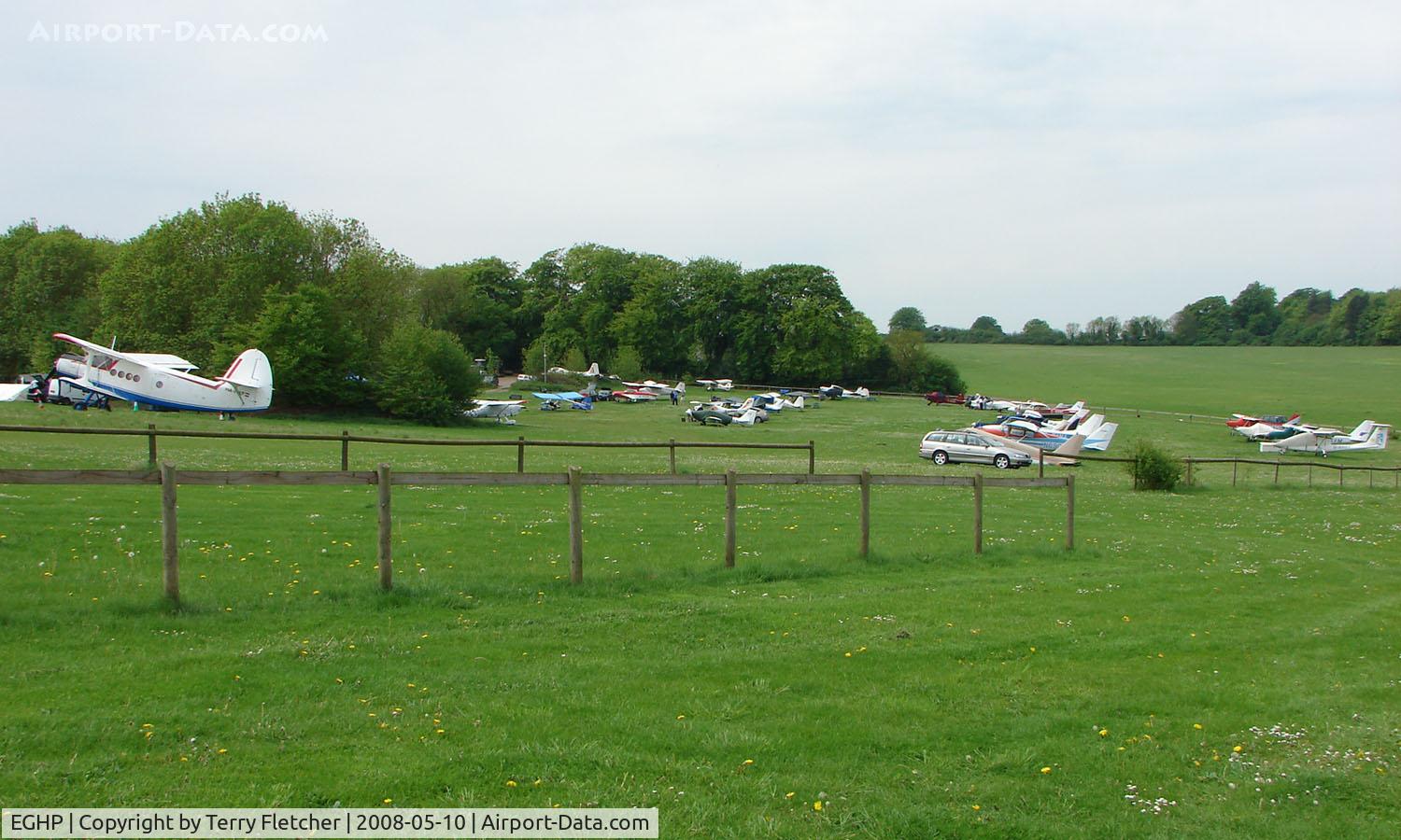 Popham Airfield Airport, Popham, England United Kingdom (EGHP) - An overall view of the mix of aircraft residents  at Popham