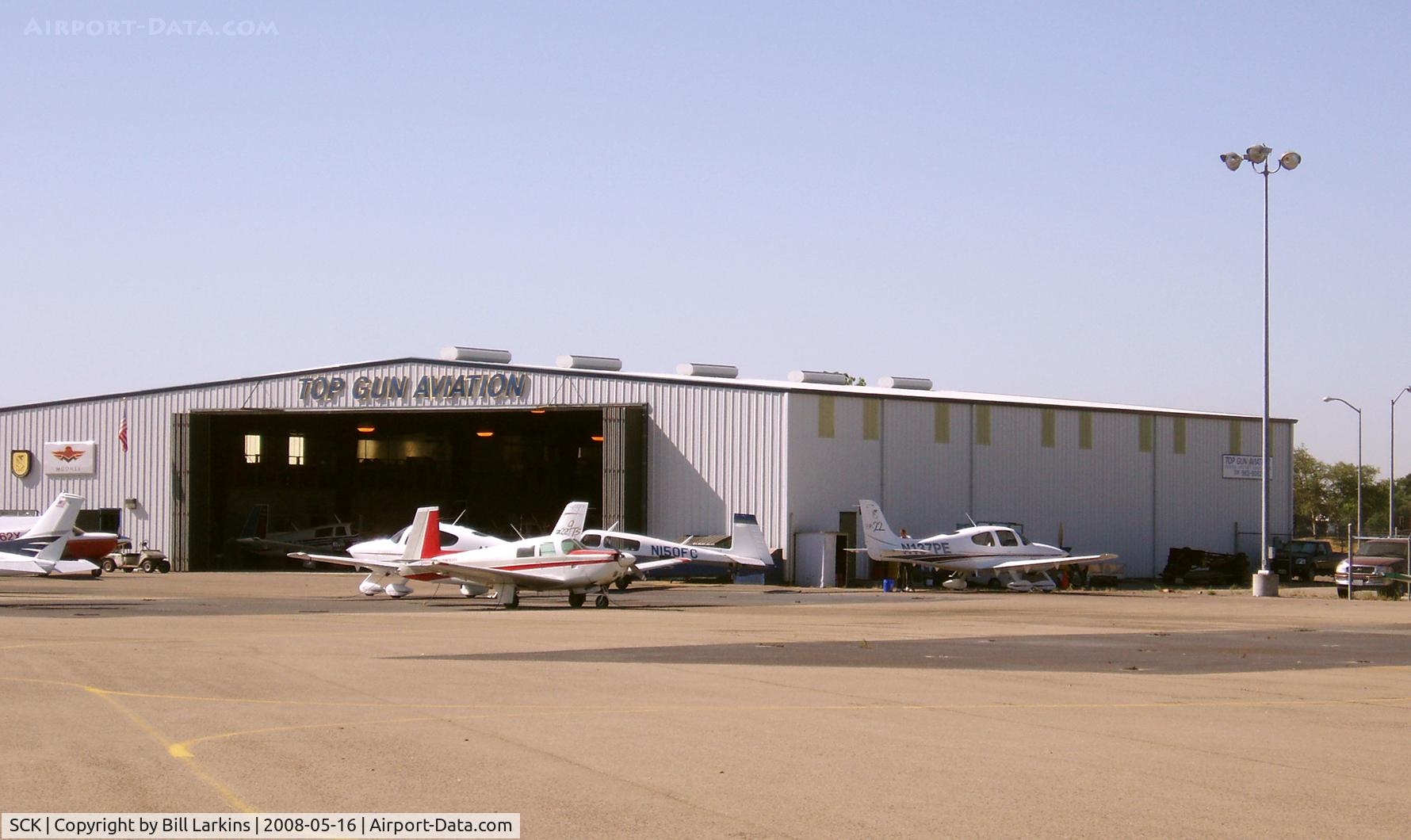 Stockton Metropolitan Airport (SCK) - Top Gun Aviation hangar