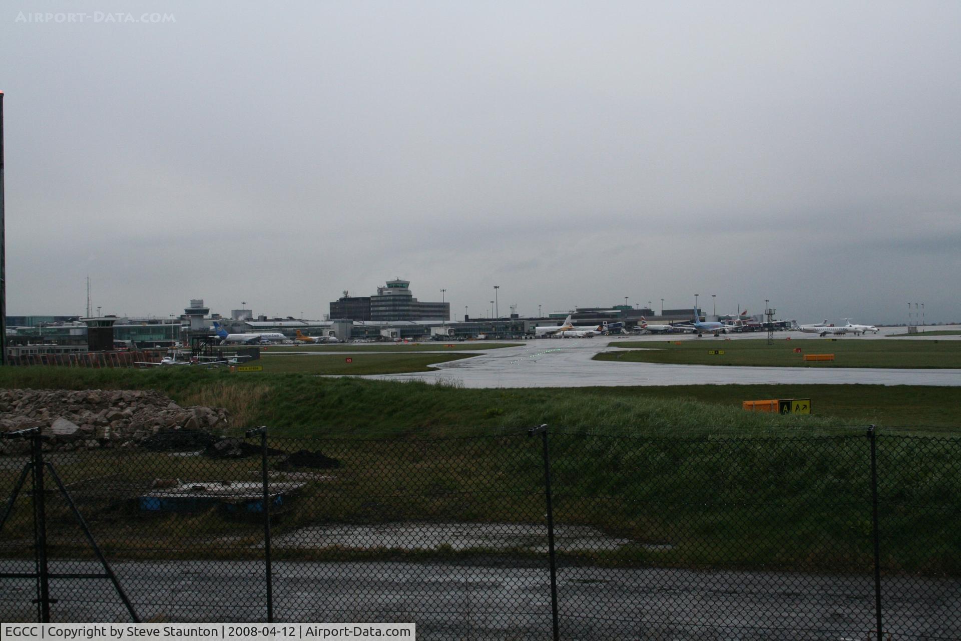 Manchester Airport, Manchester, England United Kingdom (EGCC) - Taken at Manchester Airport on a typical showery April day