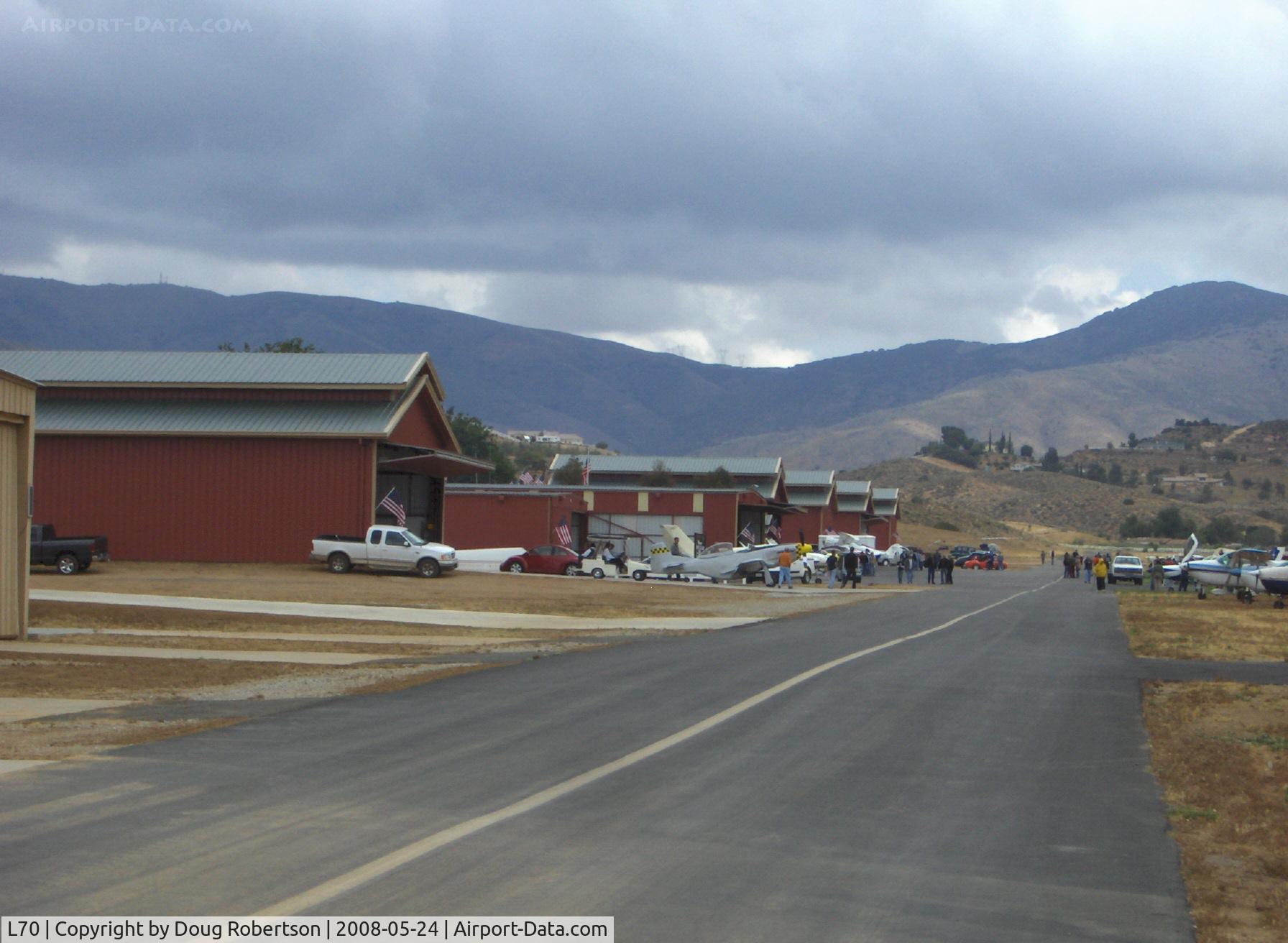 Agua Dulce Airport (L70) - Huge hangars-not crowded. Ranch barn theme. Note: taxiway is shown, not for landing.