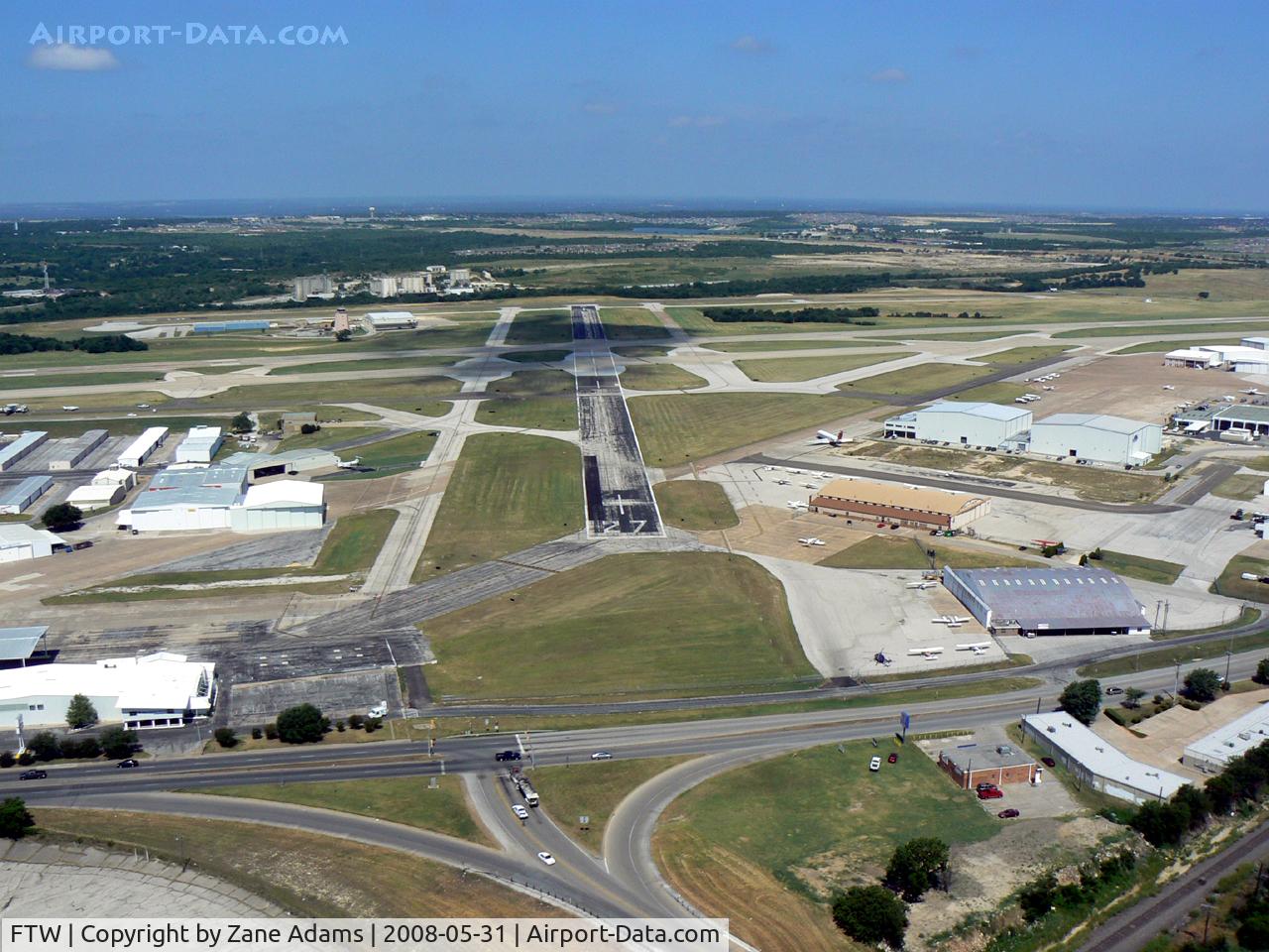 Fort Worth Meacham International Airport (FTW) - Downwind for runway 16 - looking down runway 27 - Meacham Field