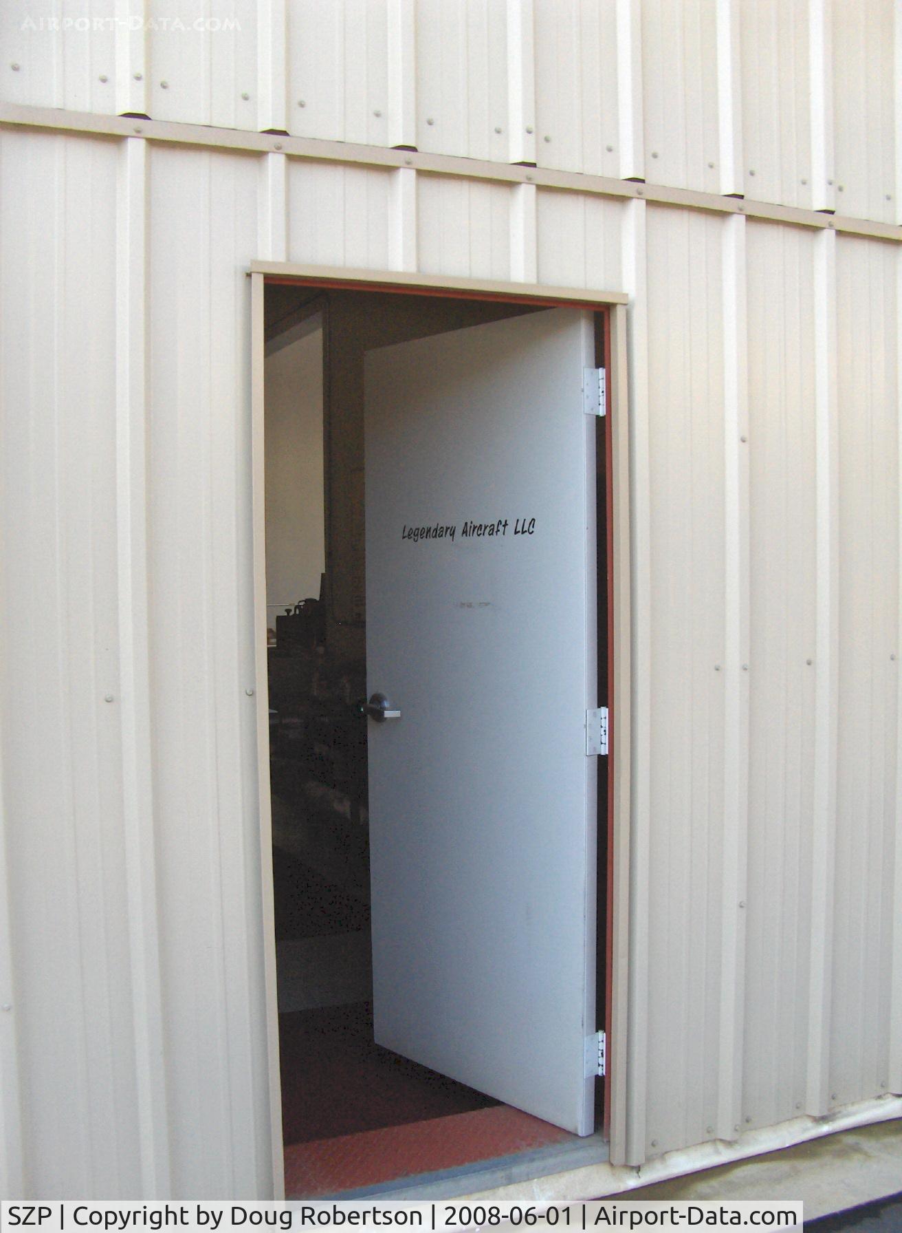 Santa Paula Airport (SZP) - Door to Hangar 2 of 2. Legendary Aircraft LLC, 70% scale TF-51, P-51D MUSTANGS in Area 51.