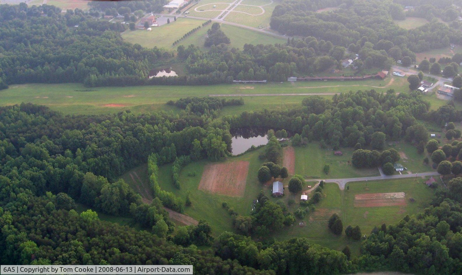 Warf Airport (6A5) - due to trees and slope, preferred takeoff 17 & land 35