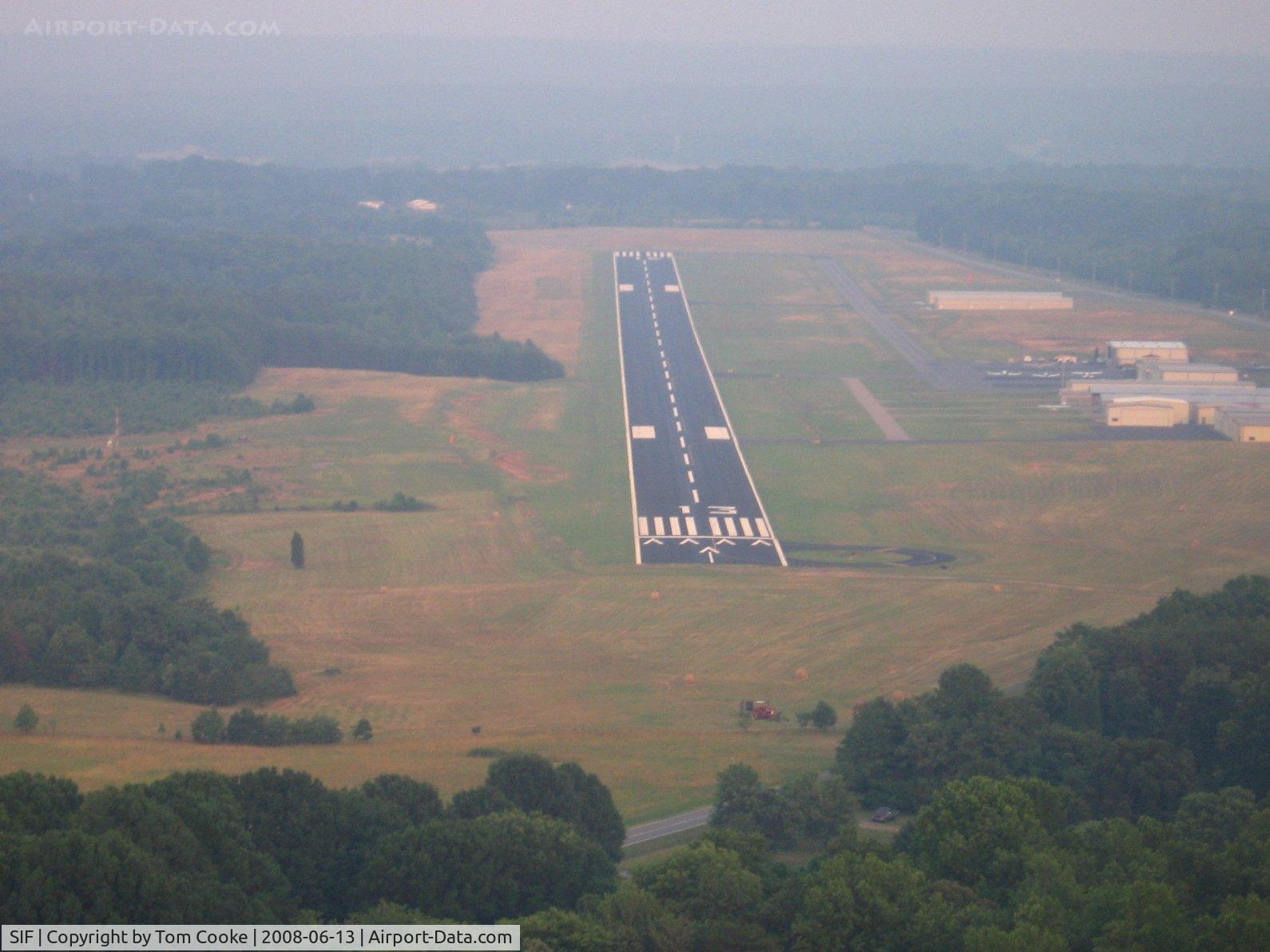 Rockingham County Nc Shiloh Airport (SIF) - short final on a hazy summer evening