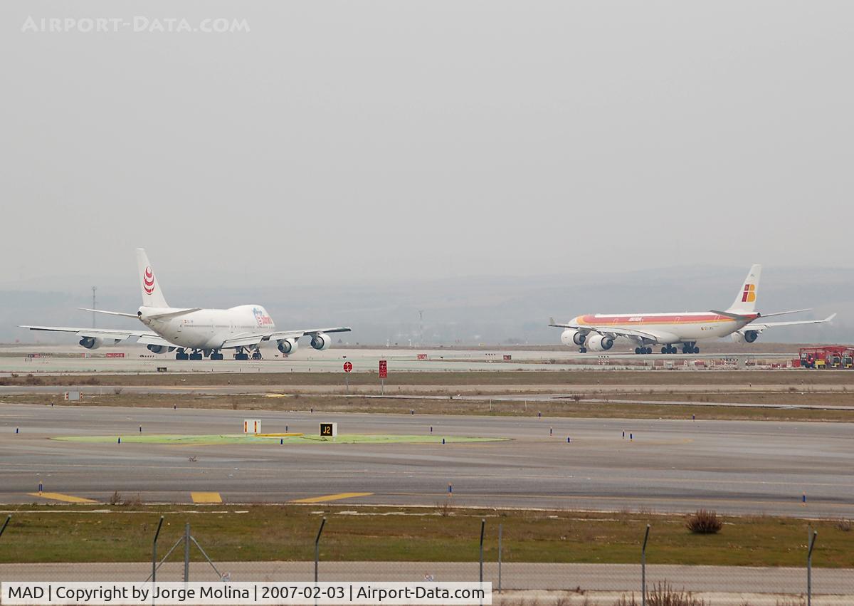 Barajas International Airport, Madrid Spain (MAD) - Two heavies espect for take off.