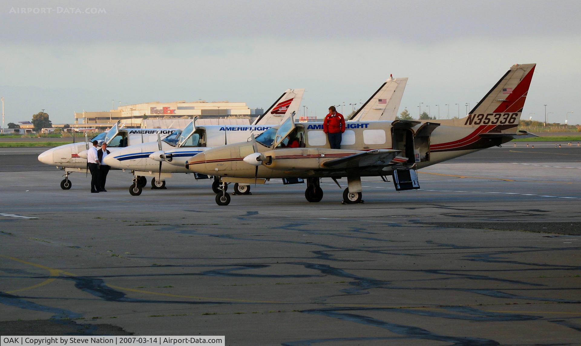 Metropolitan Oakland International Airport (OAK) - (Odd-ball colors) Ameriflight Piper PA-31-350 freighters getting ready to shut down @ Oakland International base
