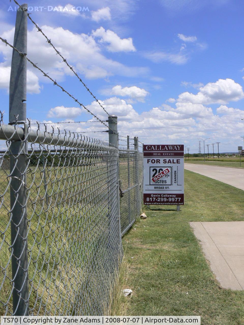 Jack Miller Airport (TS70) - Jack Miller Stolport - Now closed by encroachment and development land fenced and recently sold hanger removed. The only clue as to its former use is a windsock pole. 