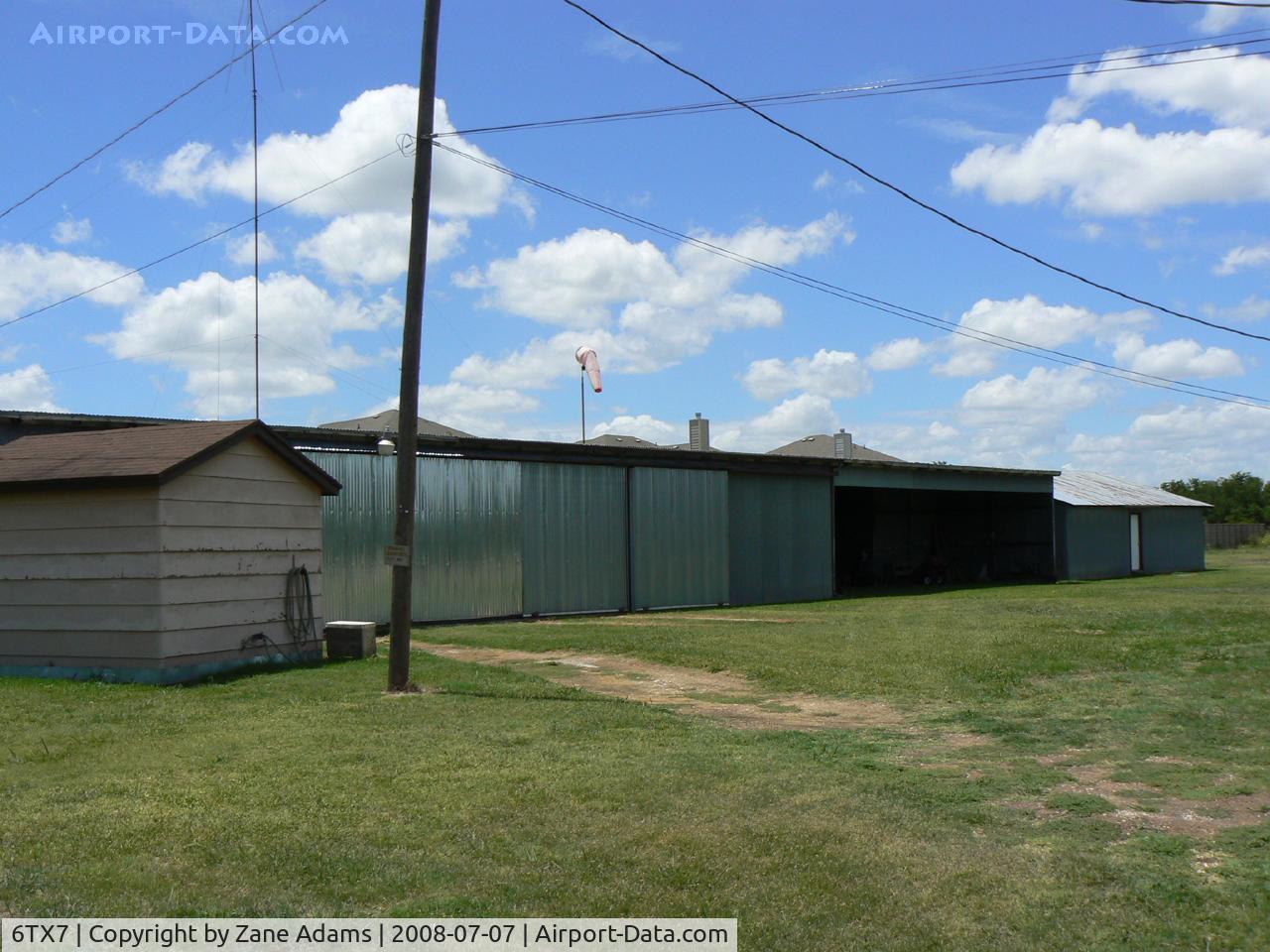 Flying L Airpark Airport (6TX7) - Flying L Private Strip - Unsure weather this airfield is still open. There is a fence and new subdivision of houses built with in yards of the hanger building, there was no airplane in the hanger and I could not see the runway