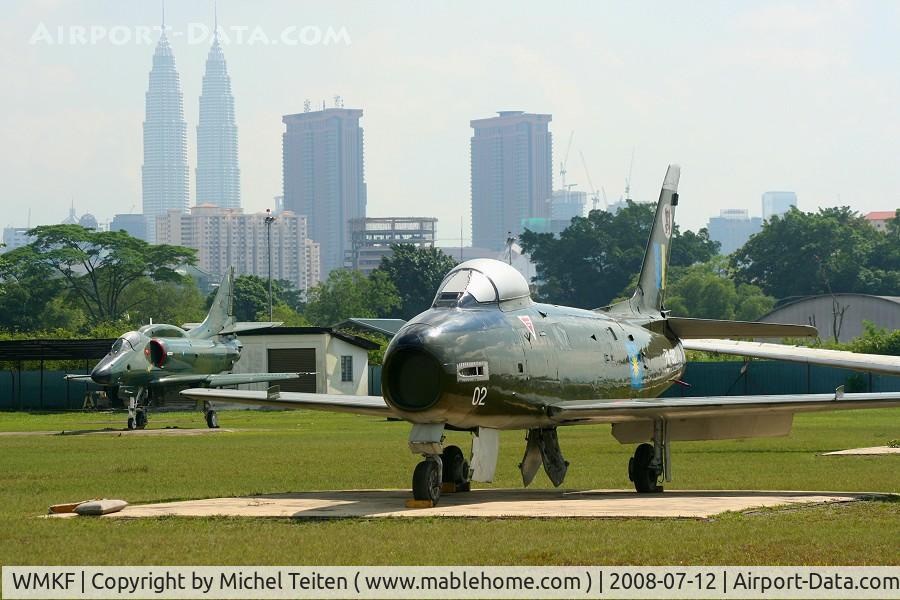 Sungai Besi Airport / RMAF Simpang, Sungai Besi, Kuala Lumpur Malaysia (WMKF) - CAC Sabre from RMAF Museum at RMAF Kuala Lumpur-Sungai Besi with the Petronias Towers in the background