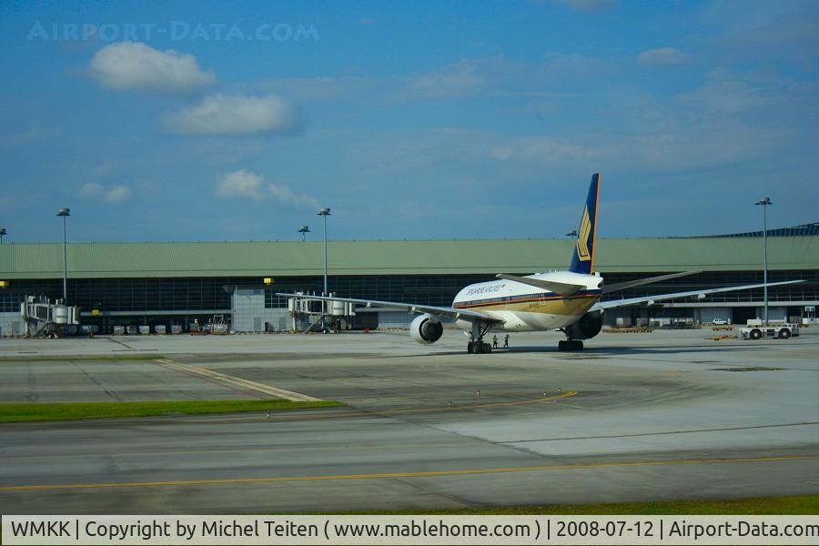 Kuala Lumpur International Airport, Sepang, Selangor Malaysia (WMKK) - Satellite A - 777 from Singapore Airlines doing the shuttle with SIN