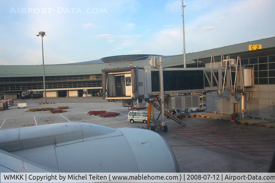 Kuala Lumpur International Airport, Sepang, Selangor Malaysia (WMKK) - Leaving gate C2 for a short flight to Singapore
