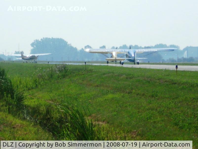 Delaware Municipal - Jim Moore Field Airport (DLZ) - Planes departing the fly-in breakfast at Delaware, OH