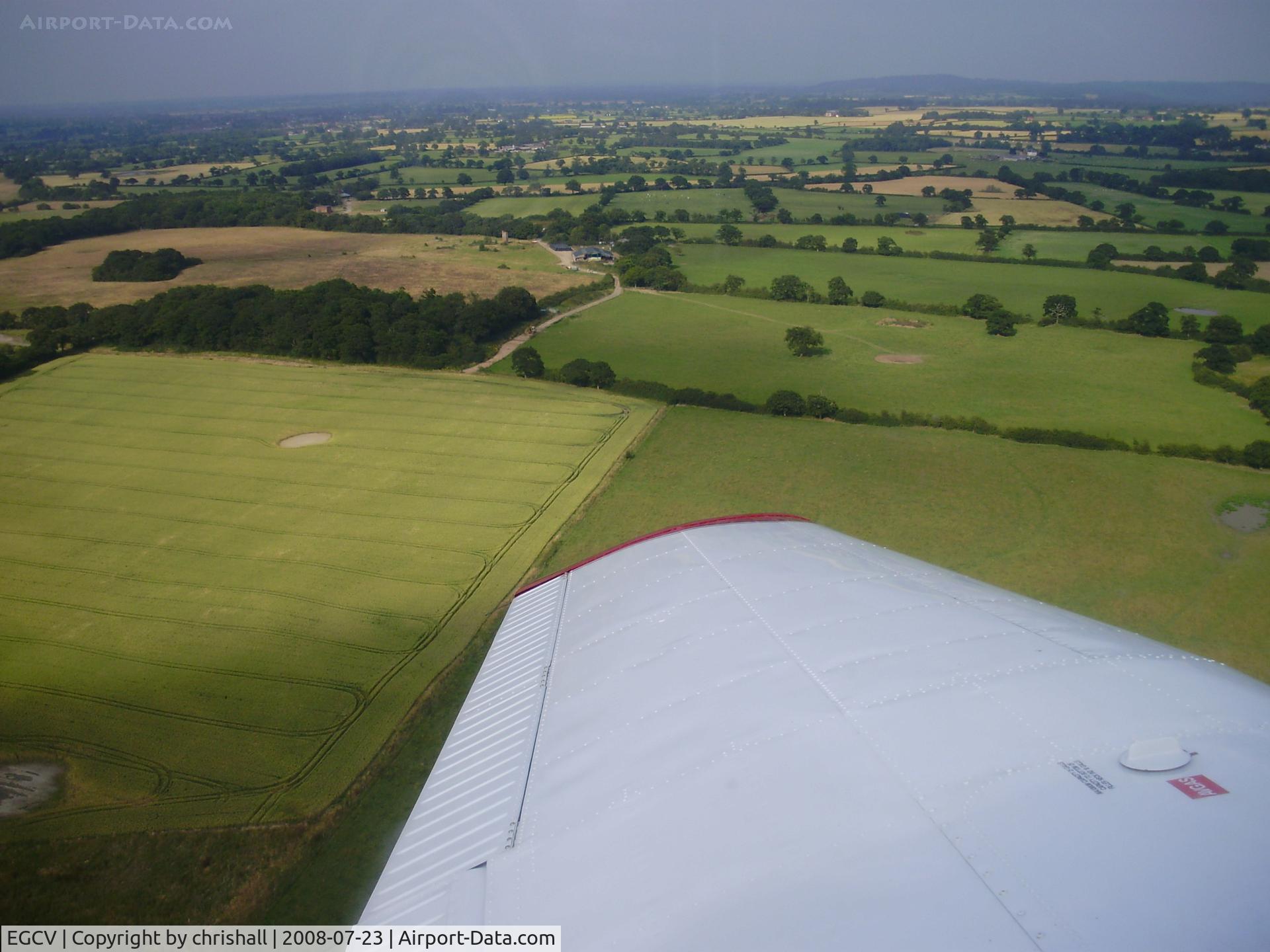 Sleap Airfield Airport, Shrewsbury, England United Kingdom (EGCV) - banking left just after take-off