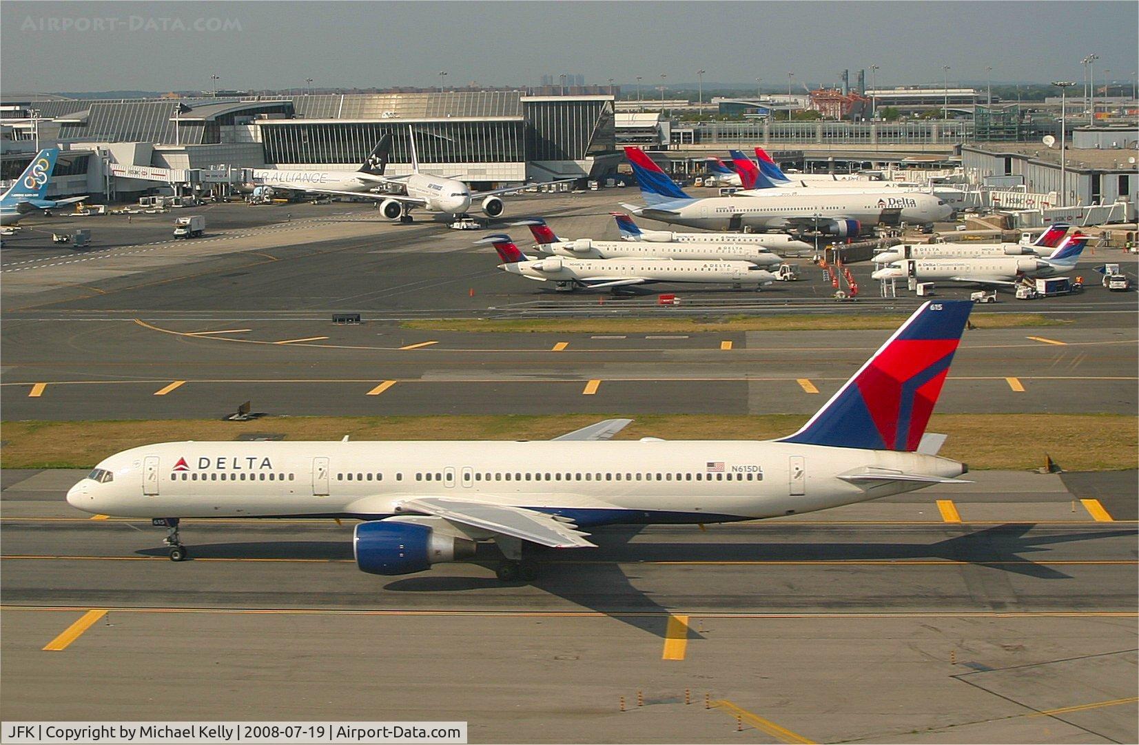 John F Kennedy International Airport (JFK) - Delta's B757 N615DL taxis past the Delta terminal towards runway 13R at JFK