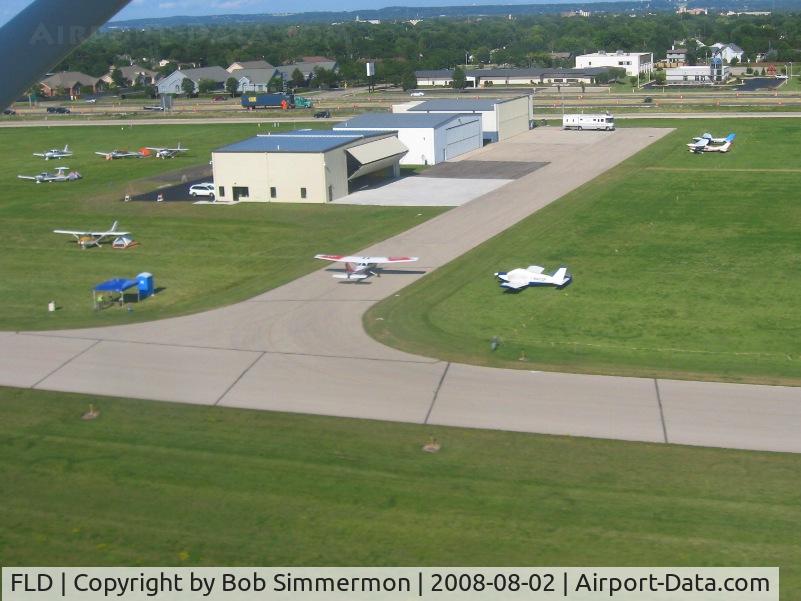Fond Du Lac County Airport (FLD) - Corporate hangers, departing 36.