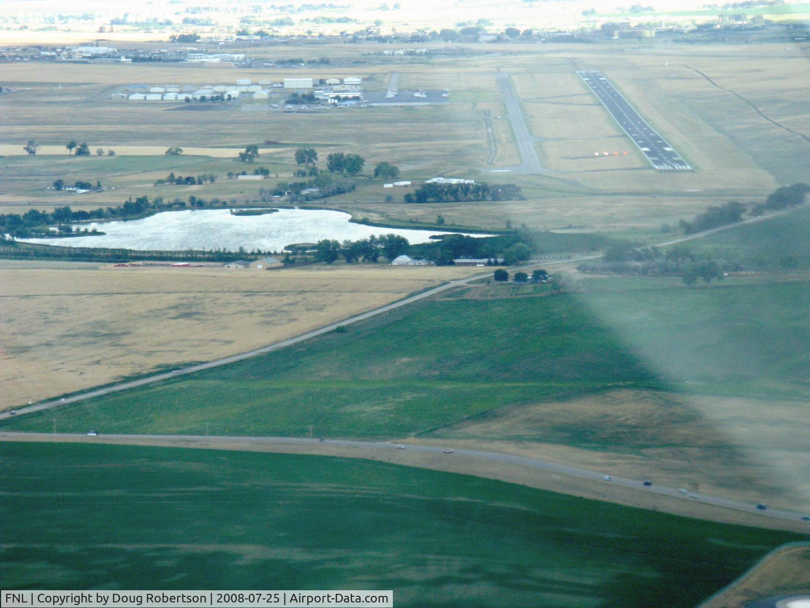Fort Collins-loveland Municipal Airport (FNL) - Fort Collins-Loveland Municipal, CO. On base leg, Rwy 15 the active. From N2111Q Beech BONANZA 36.