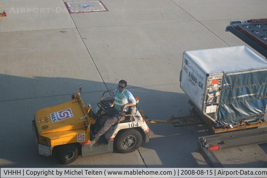 Hong Kong International Airport, Hong Kong Hong Kong (VHHH) - Waiting for baggages near an A330 from Dragonair