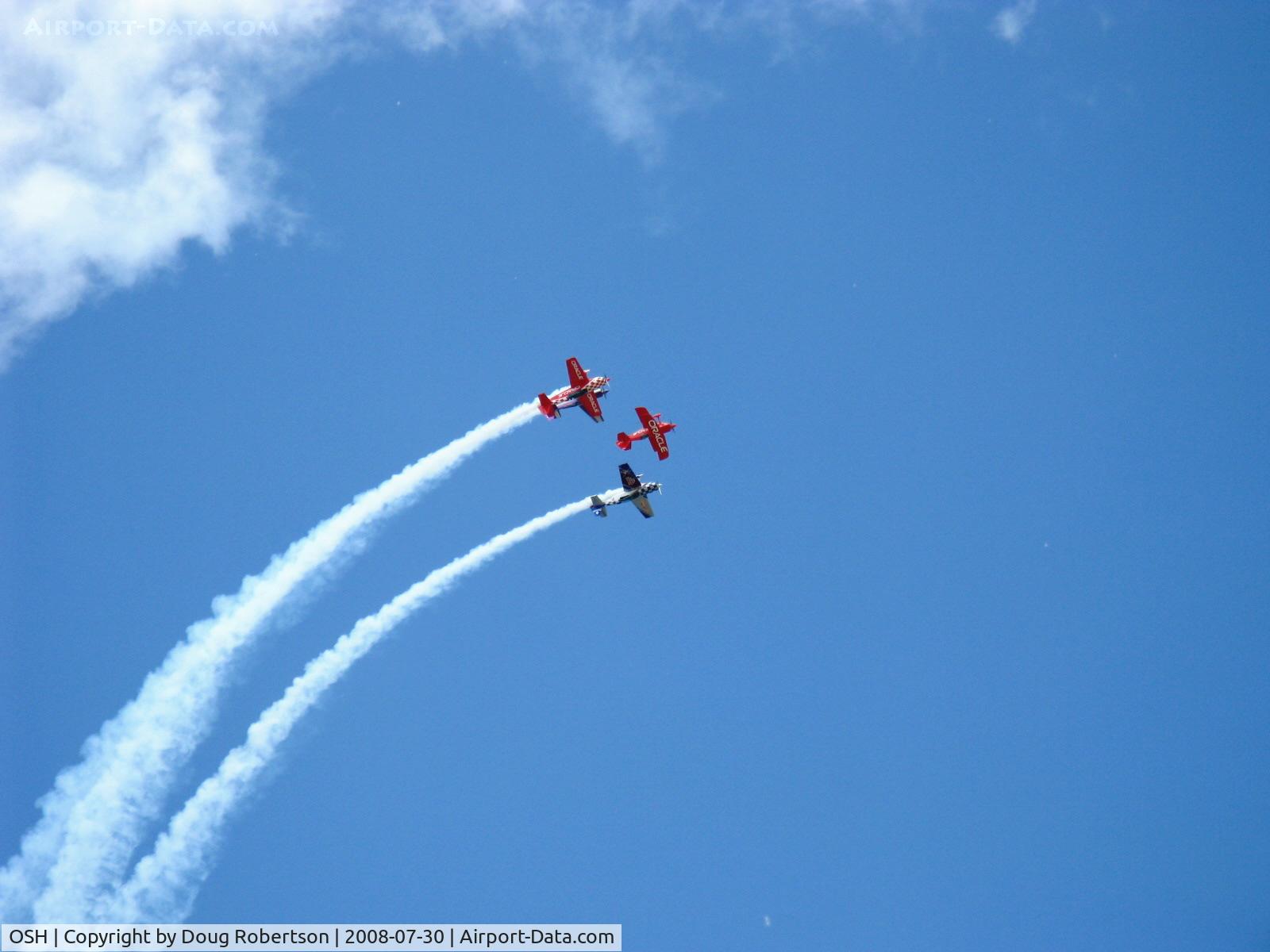 Wittman Regional Airport (OSH) - EAA 2008 AirVenture Daily Airshow Aerobatics-Sean Tucker & Group inverted echelon climb