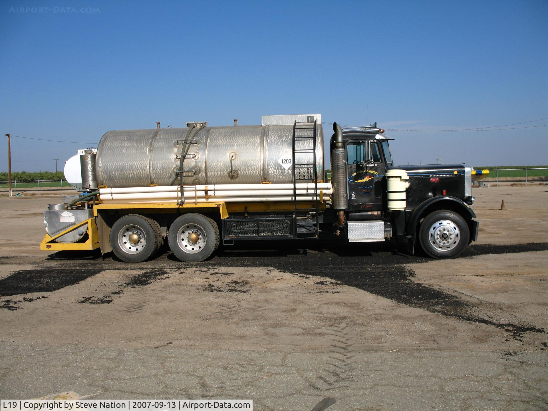 Wasco-kern County Airport (L19) - Tri-Star Agrinautics (cropdusters) mother truck at Wasco-Kern County Airport, CA
