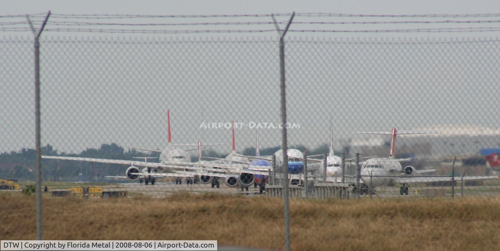Detroit Metropolitan Wayne County Airport (DTW) - Line up of aircraft waiting to depart DTW