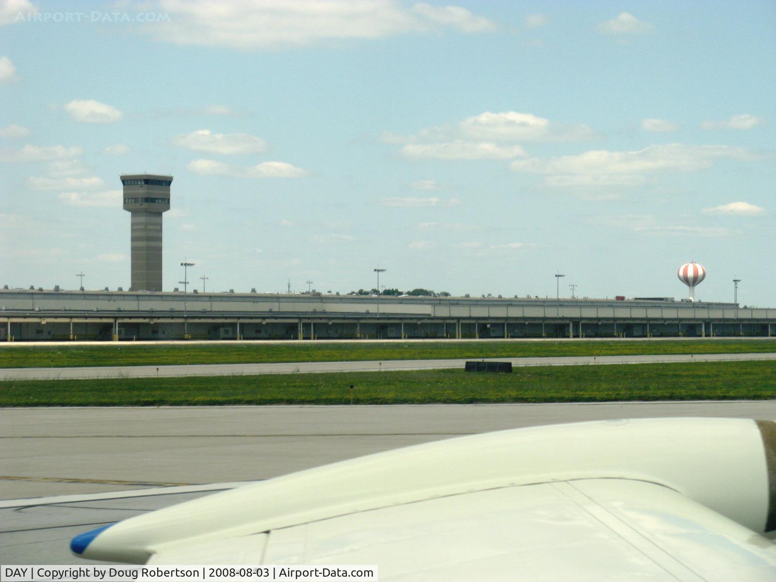 James M Cox Dayton International Airport (DAY) - Several towers on this airport-this is NOT the Air Traffic Control Tower. From N2111Q Beech BONANZA 36 taxiing in