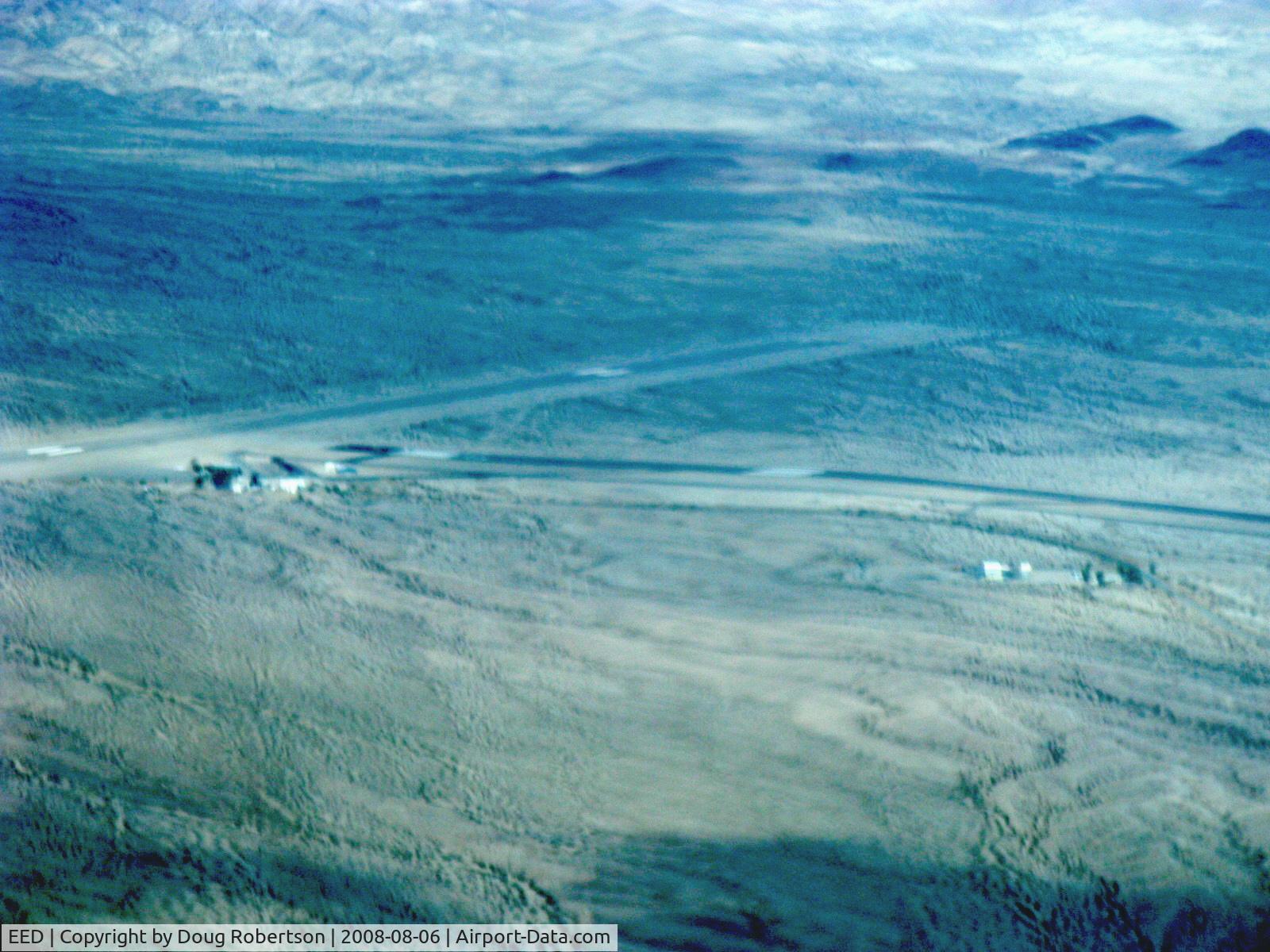 Needles Airport (EED) - Needles Airport, CA at altitude from N2111Q Beech BONANZA 36, Rwy 11-29 5005 X 100 paved, good condition, Rwy 02-20 4235 X 100 paved, fair condition. Needles is one of hottest CA temperature reporting points, reaches 118-120 degrees F. Elev. 983'